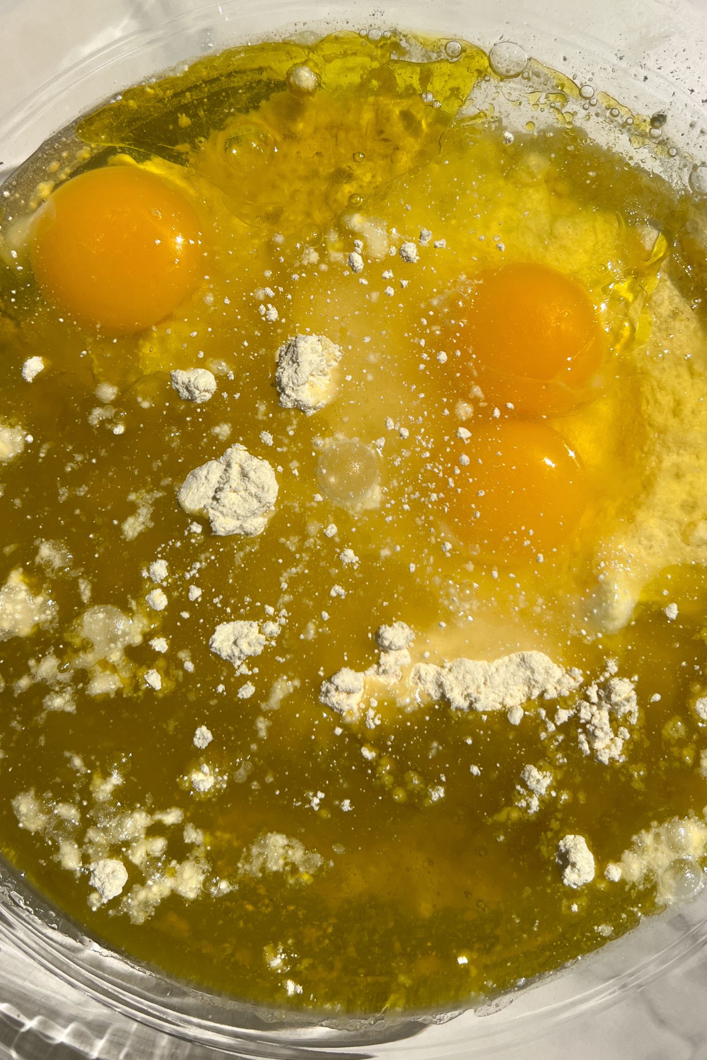 Making cake batter in a bowl.