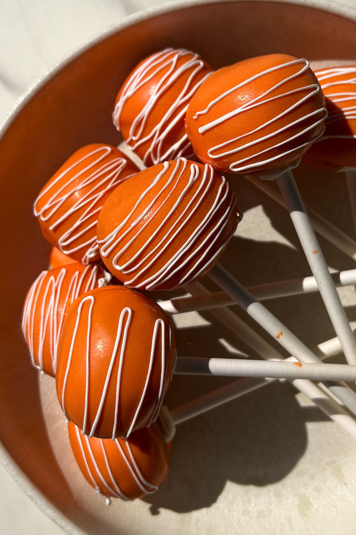 Cake pops in a bowl.