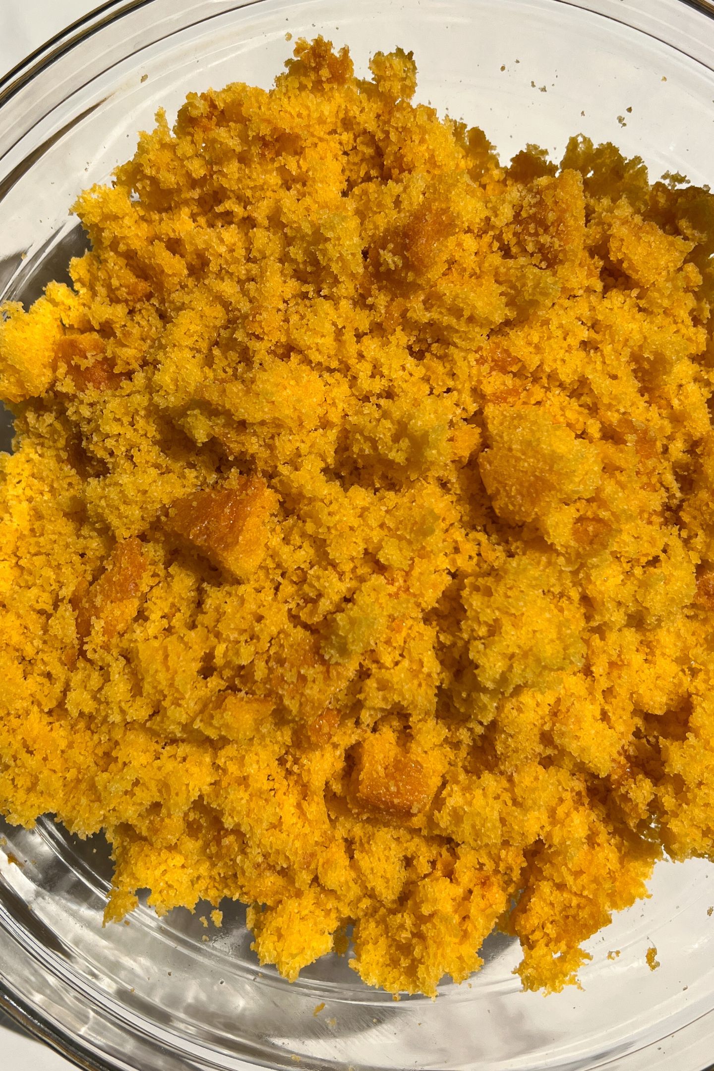 Crumbled cake in a bowl.