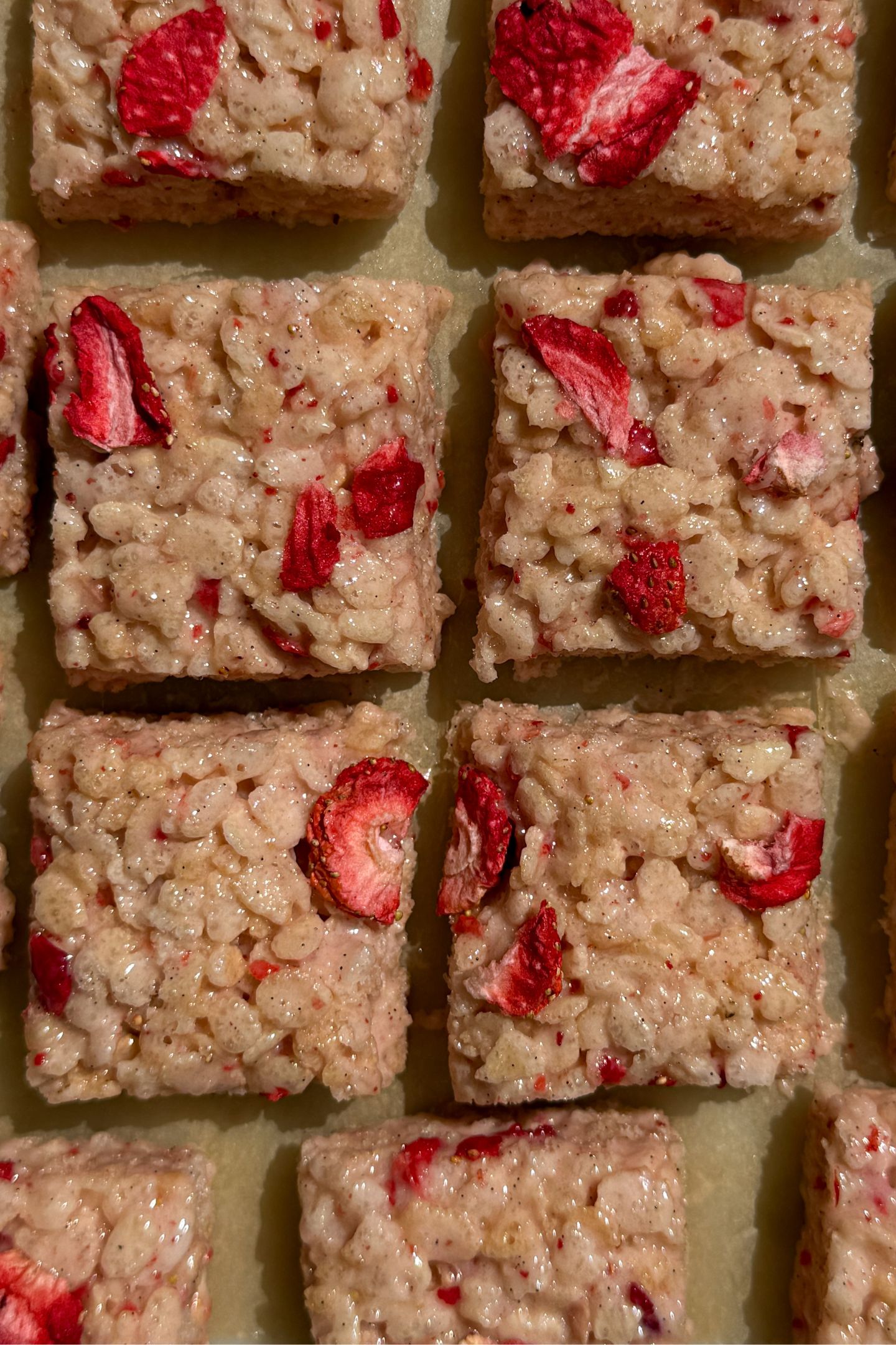 Sliced Rice Krispie Treats with freeze-dried strawberries throughout.
