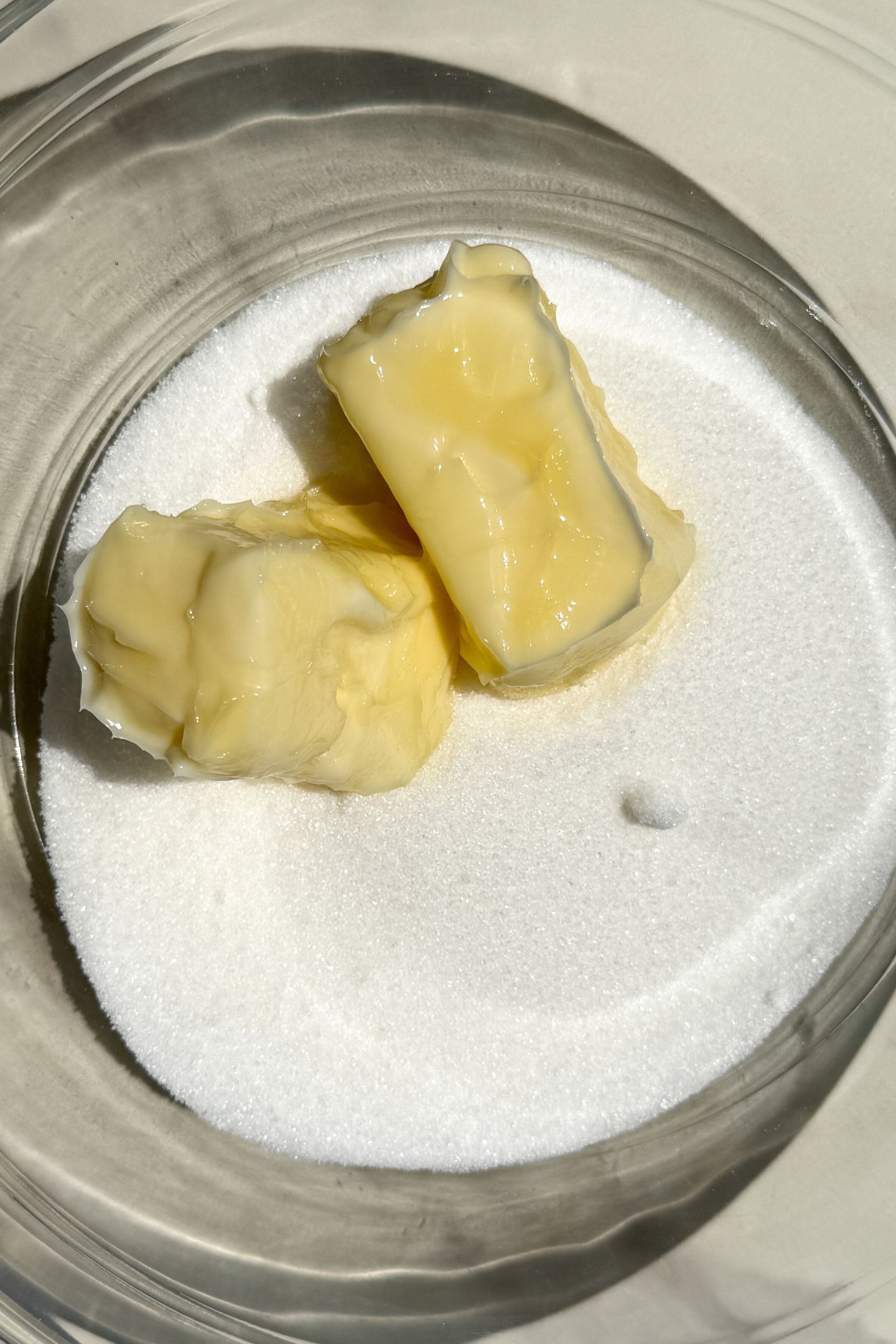 Softened butter and granulated sugar in a mixing bowl.