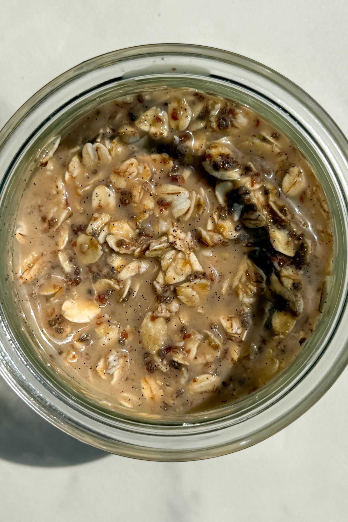 Overnight oats in a jar before soaking overnight.