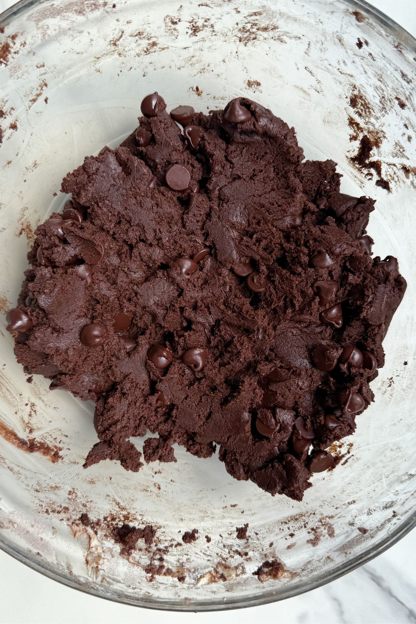 Chocolate cookie dough in a bowl.