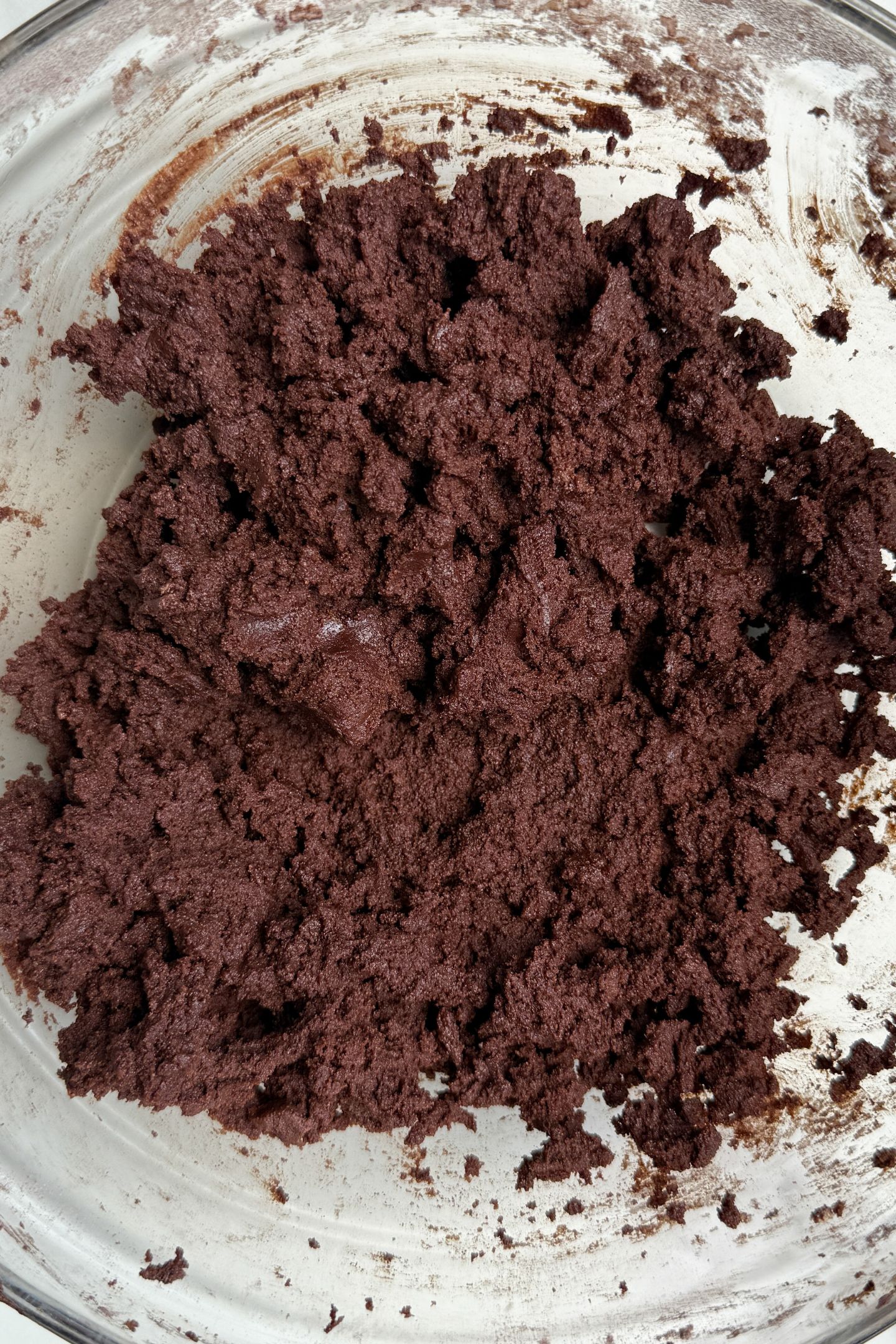 Chocolate cookie dough in a bowl.
