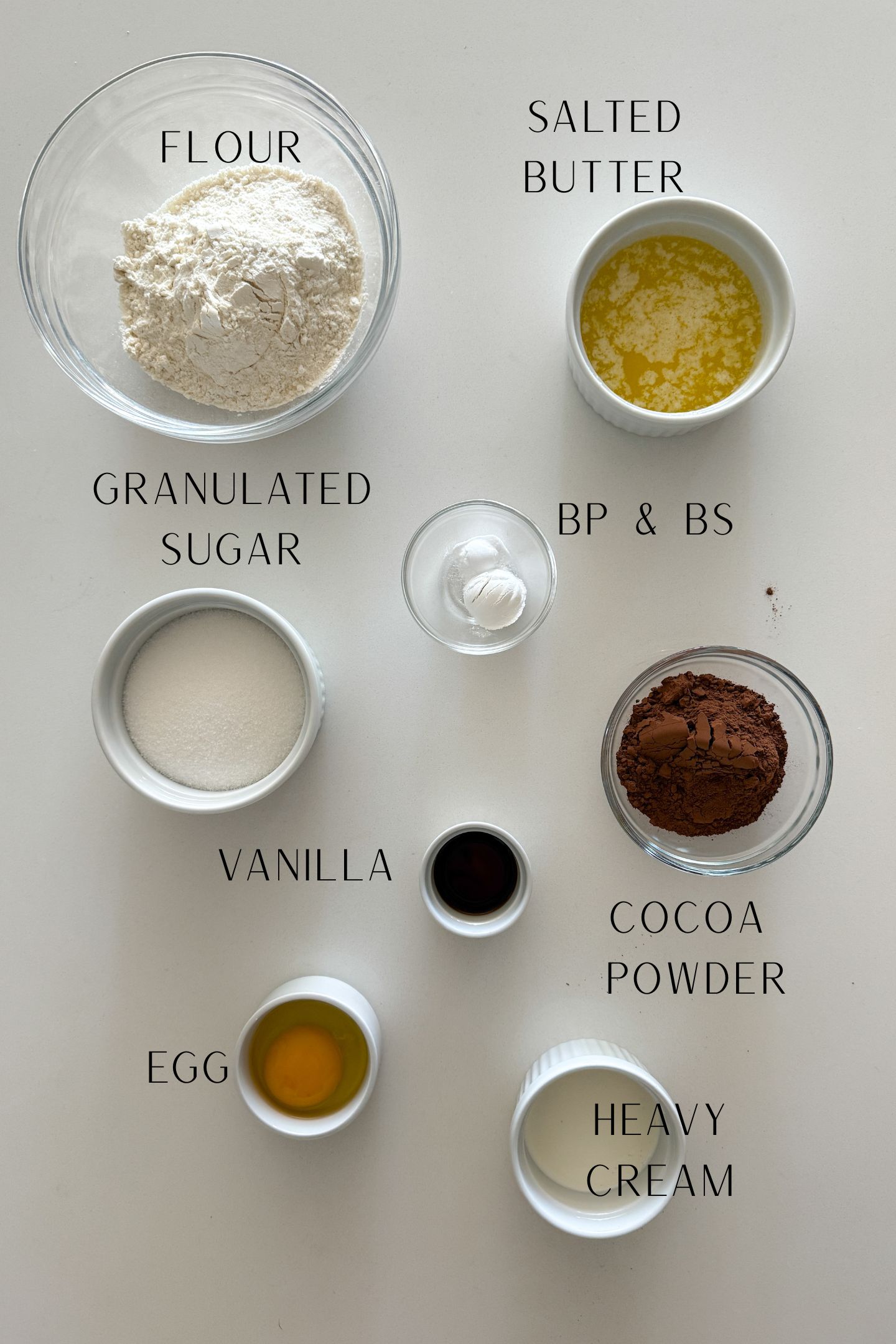 Ingredients measured out in bowls to make the chocolate cookies.