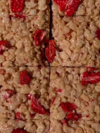 Sliced Rice Krispie Treats with freeze-dried strawberries throughout.