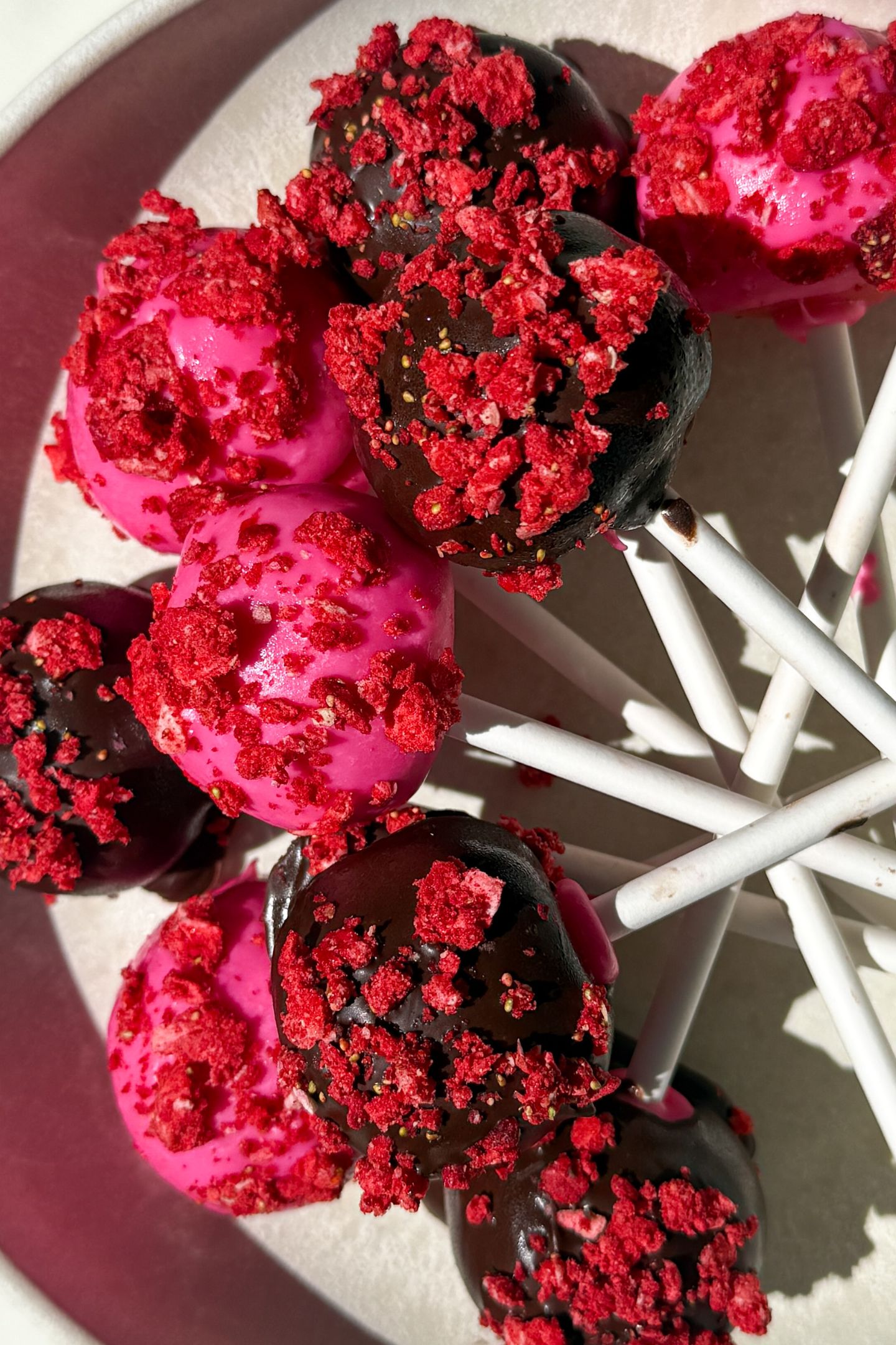 Strawberry Cake Pops on a platter.