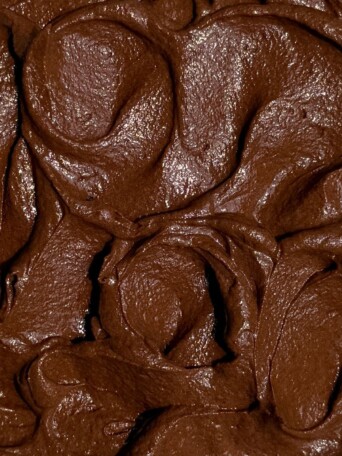 Chocolate buttercream made with melted chocolate in a bowl.