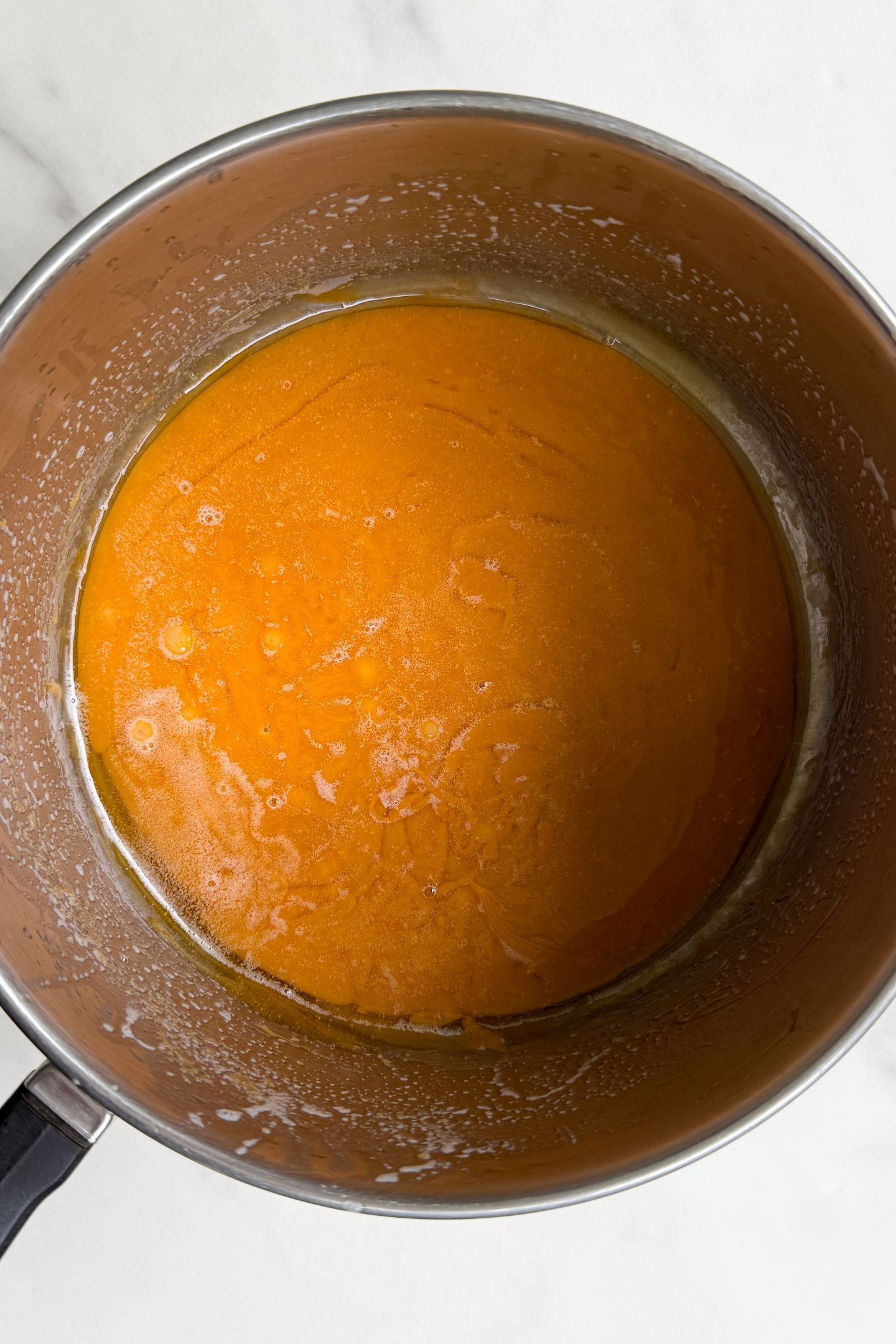 Melted butter and sugar in pot.