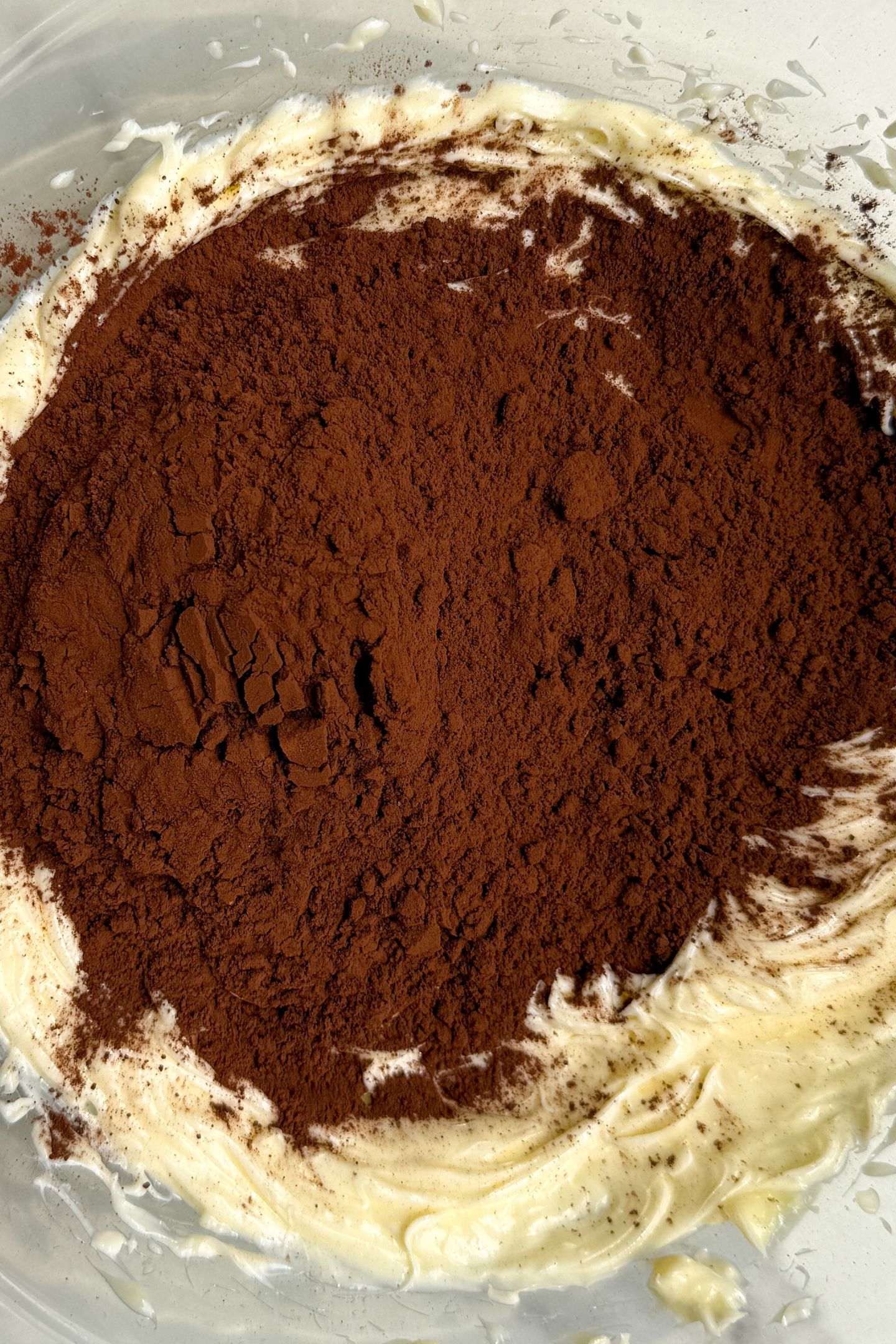 Making the chocolate buttercream in the bowl.