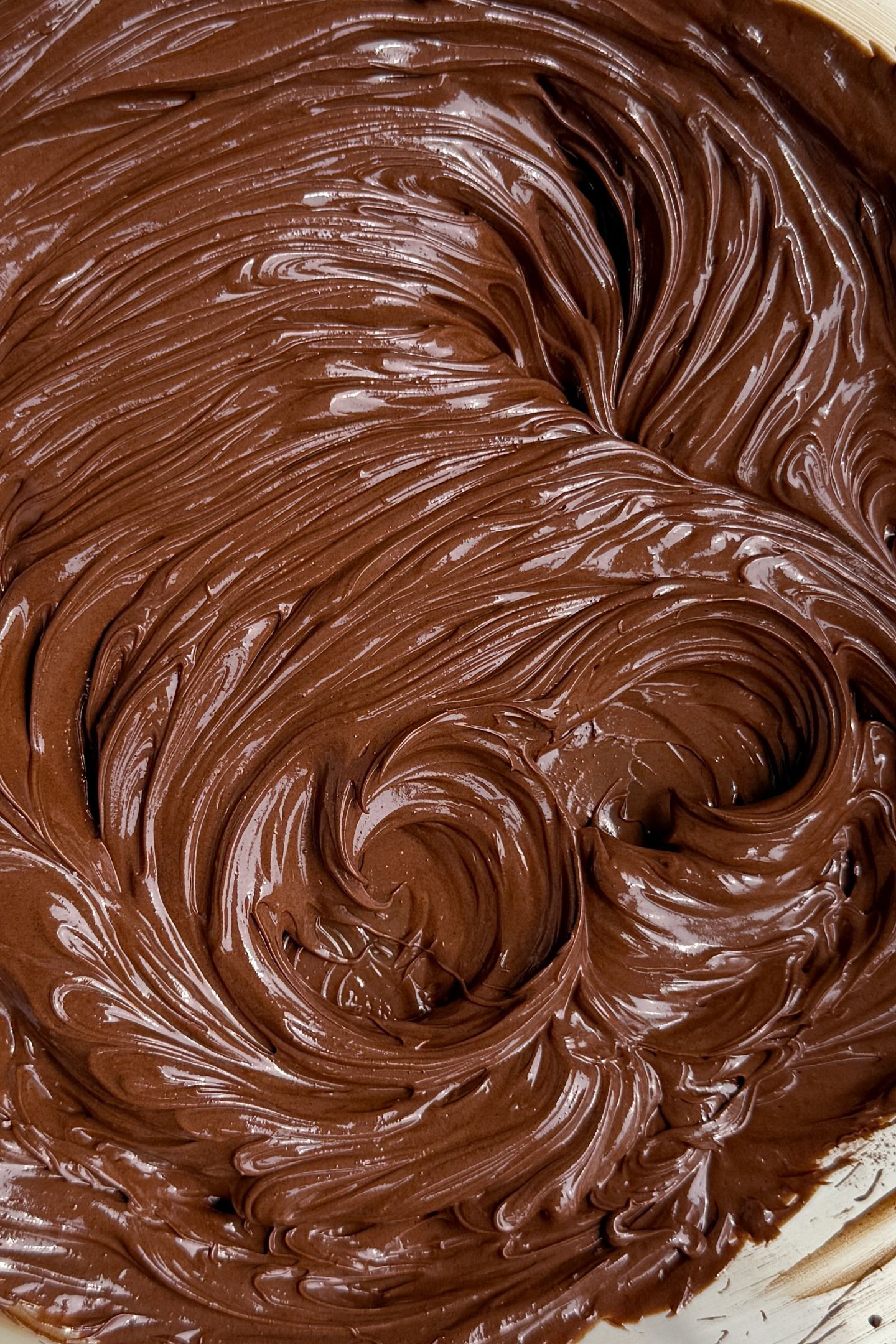 Making the chocolate buttercream in the bowl.