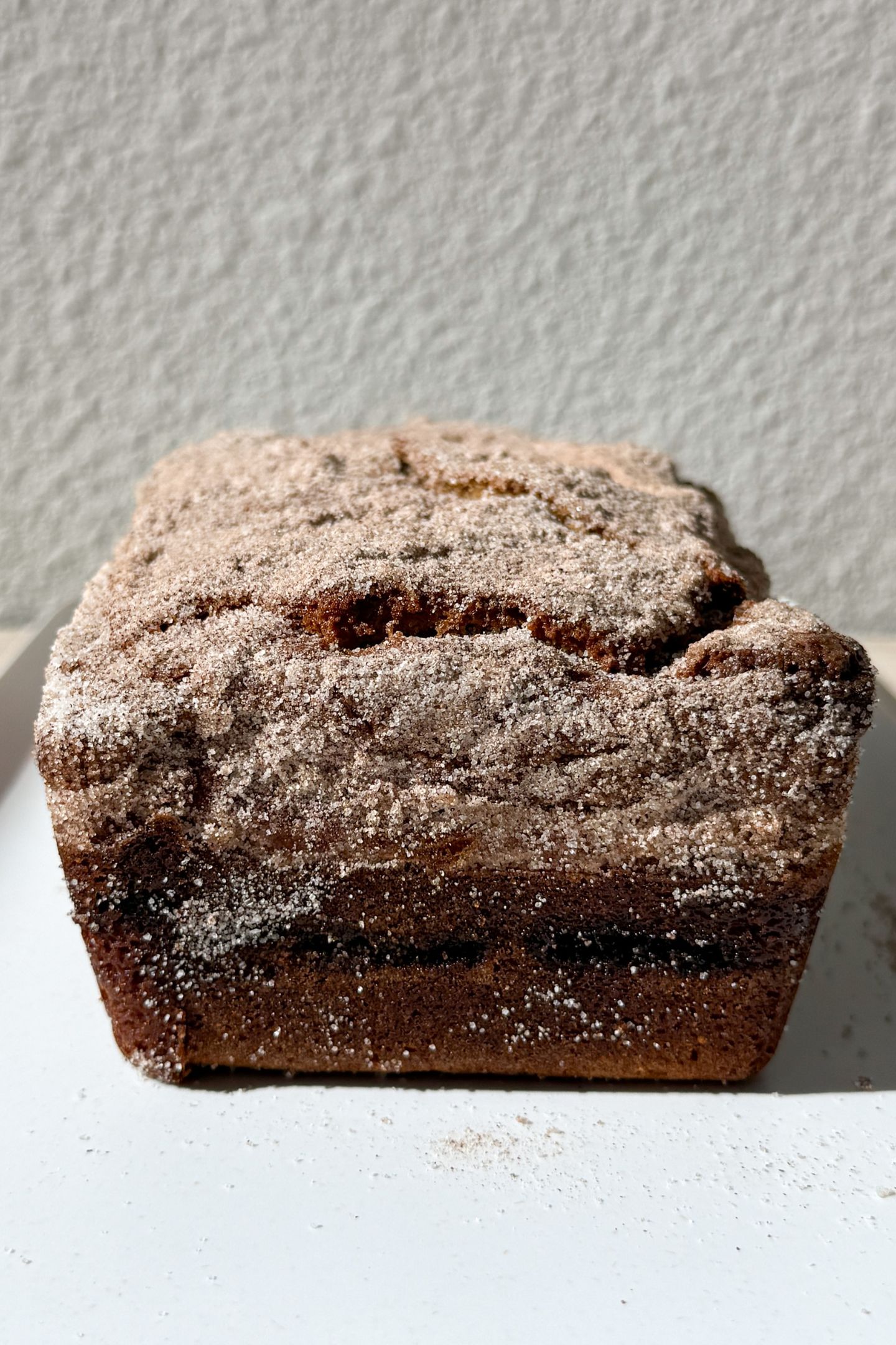 Side view of the apple cider donut bread to show the layers.