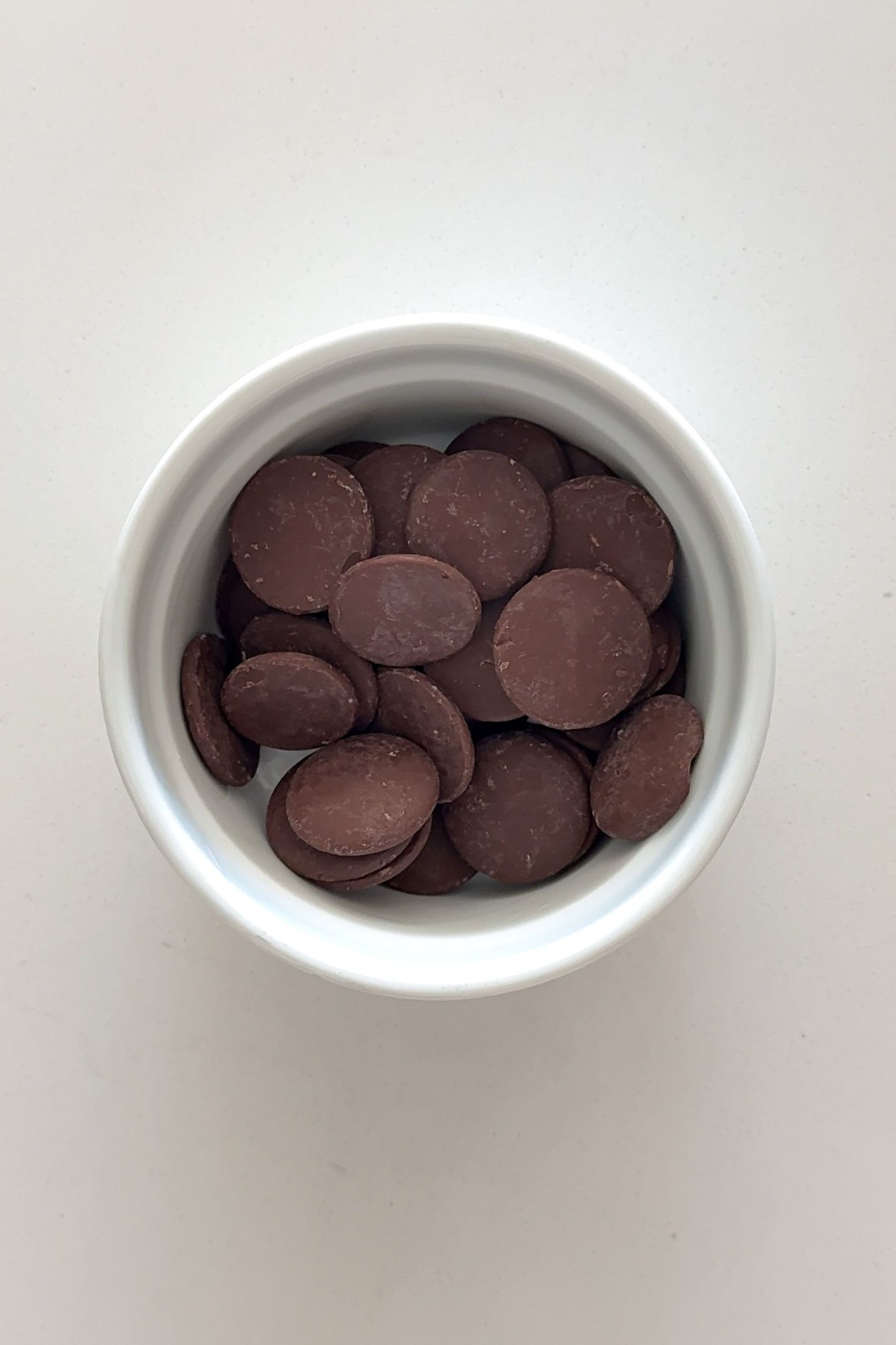 Chocolate wafers in a microwave safe bowl.