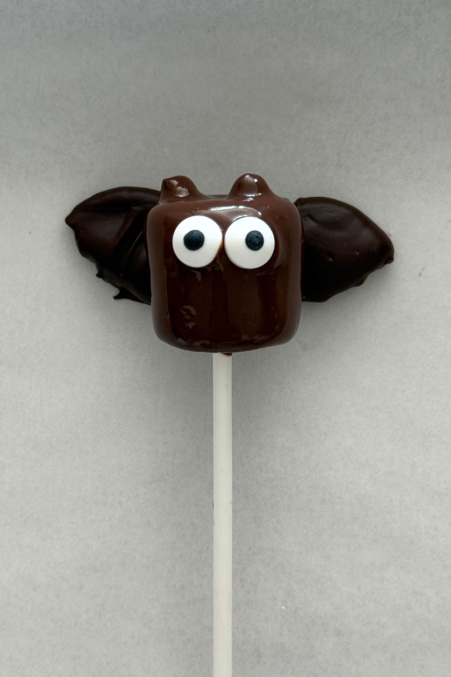 Adding a coated marshmallow to the wings.