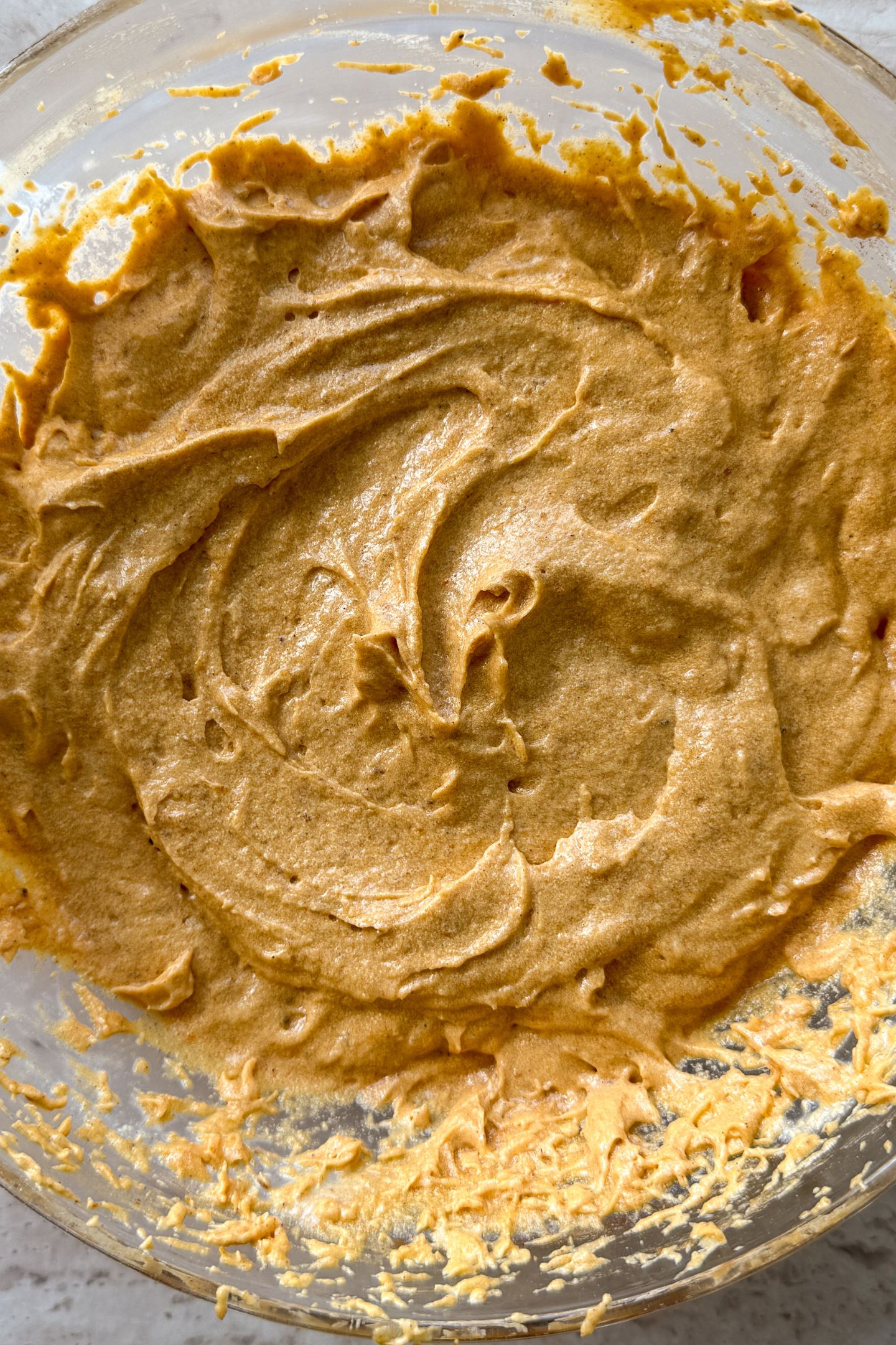 The pumpkin bread batter combined in a bowl.