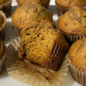 Pumpkin Banana Bread Muffin with a bite taken out of it.