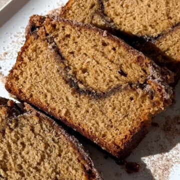 Slice of apple cider donut bread showing the layers.