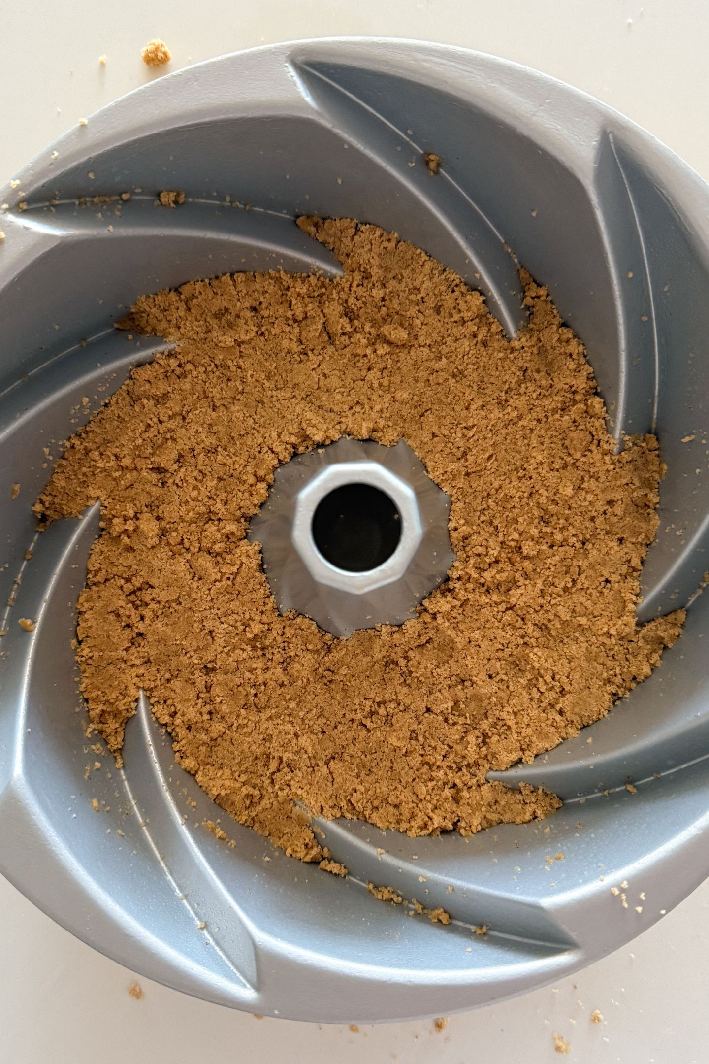 Crumb topping in the bottom of the bundt pan.