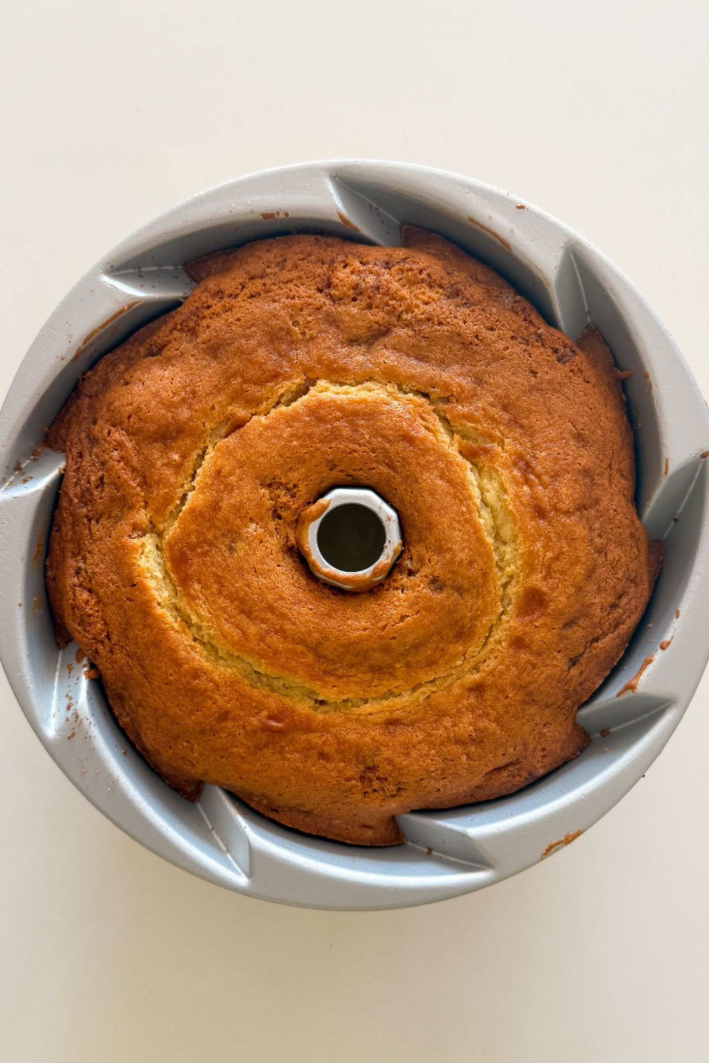 The coffee cake bundt cake baked in the pan.