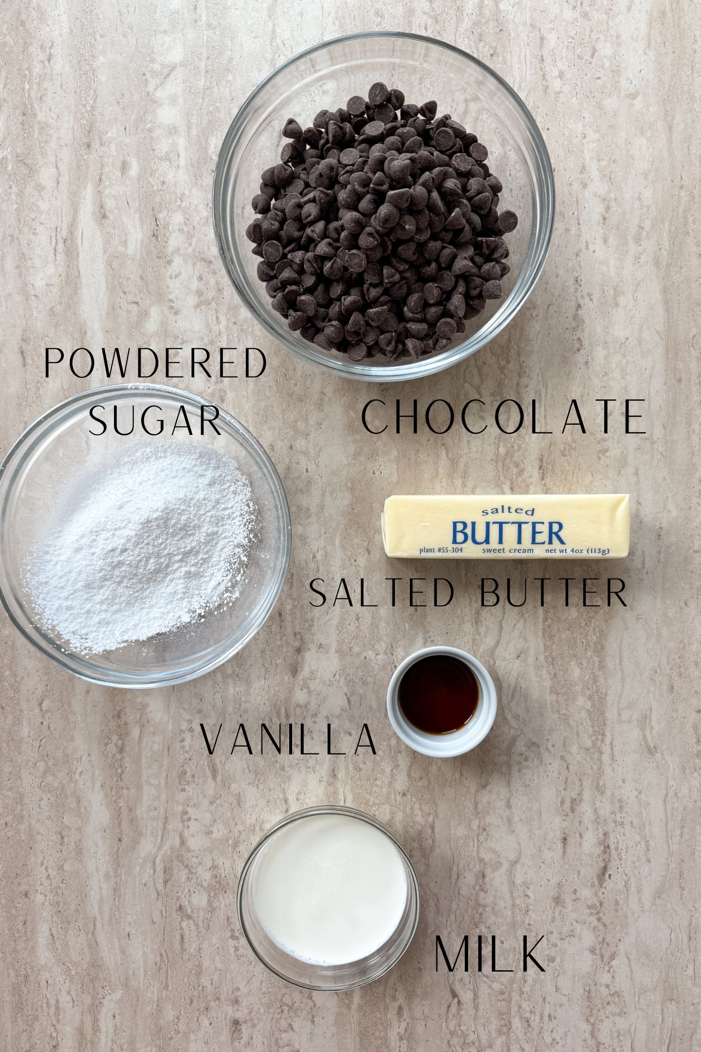 Ingredients measured out in bowls to make homemade fudge.