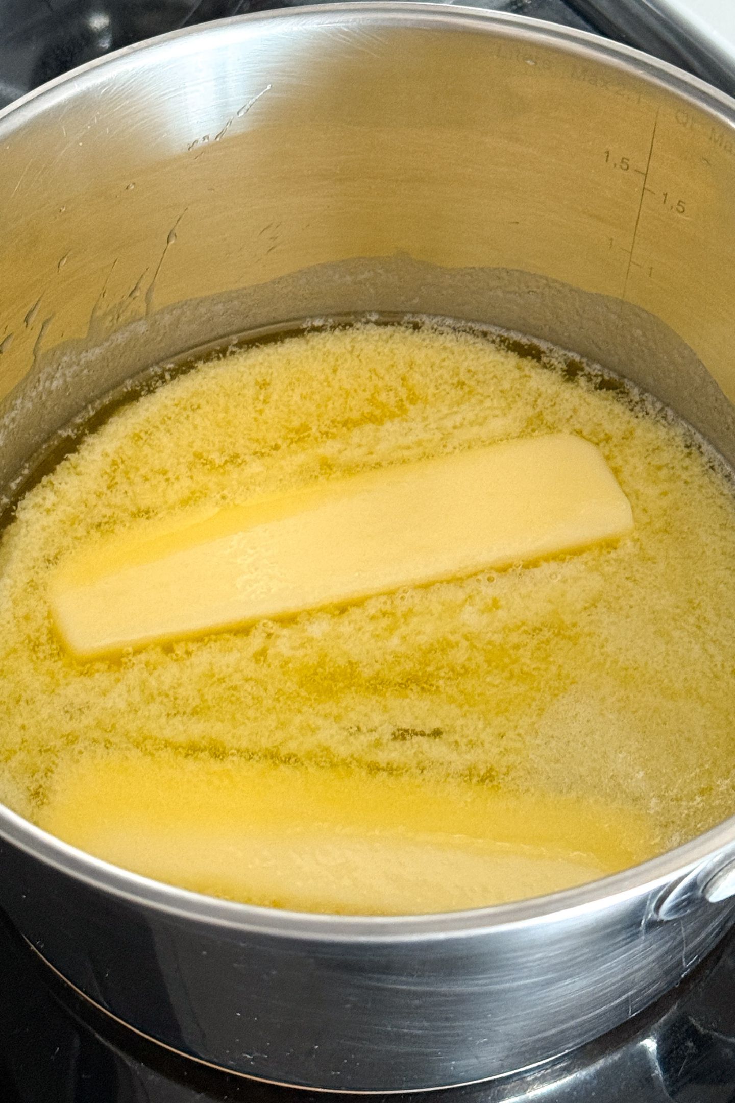 Salted butter melting in a saucepan.