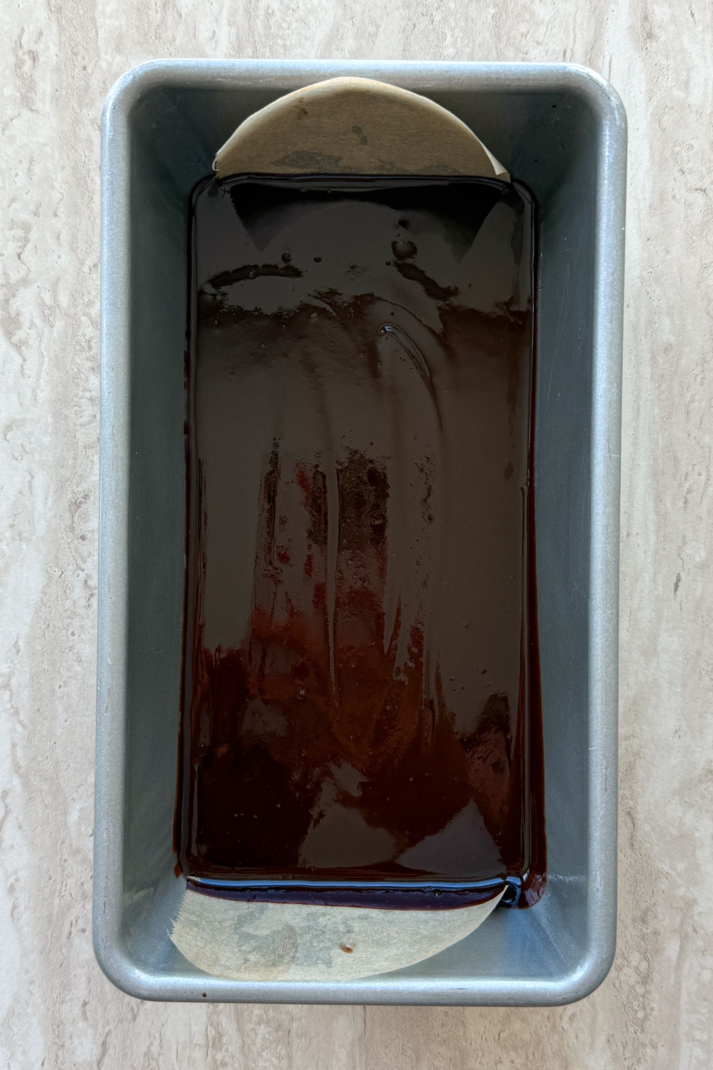 Melted fudge in a loaf pan.