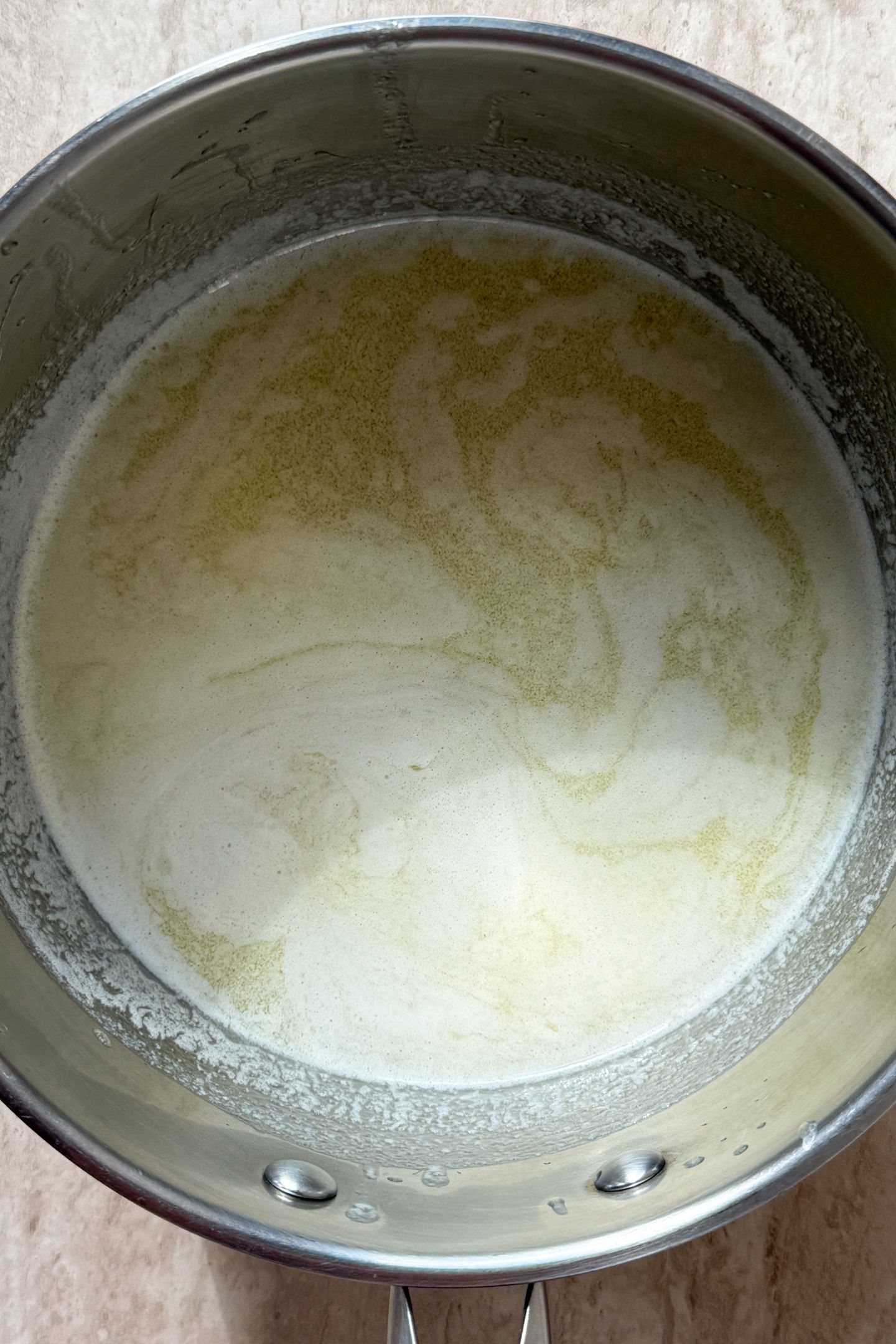Melted butter in a saucepan.