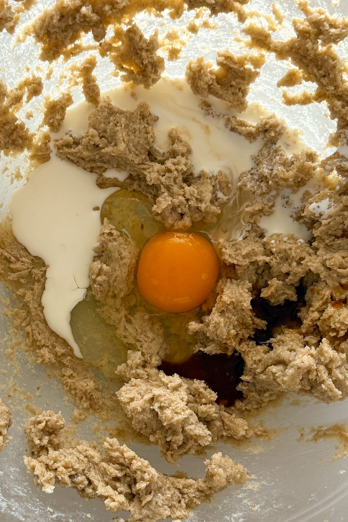 Combining the wet ingredients in a bowl.