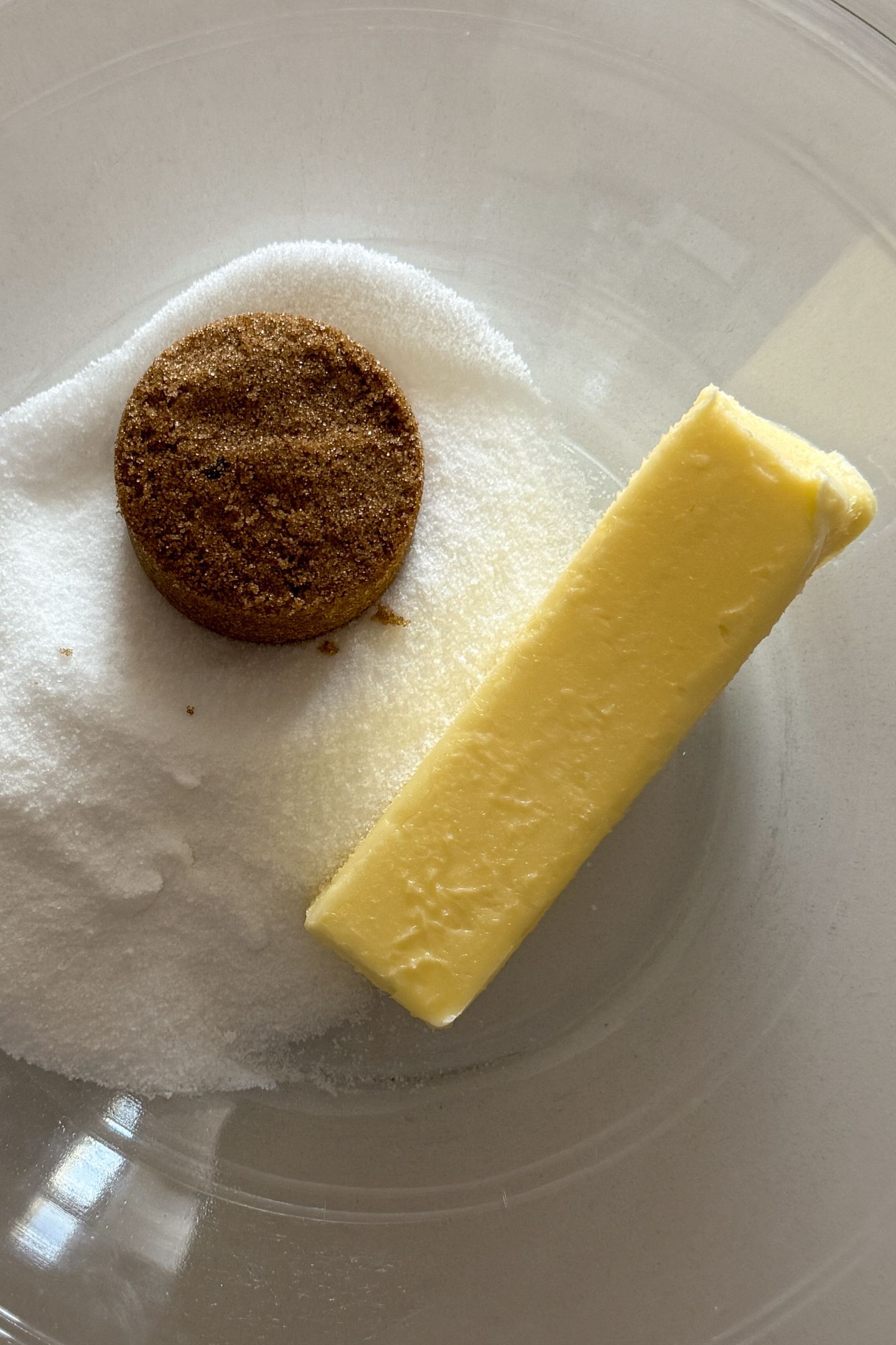 Softened butter and sugars in bowl.