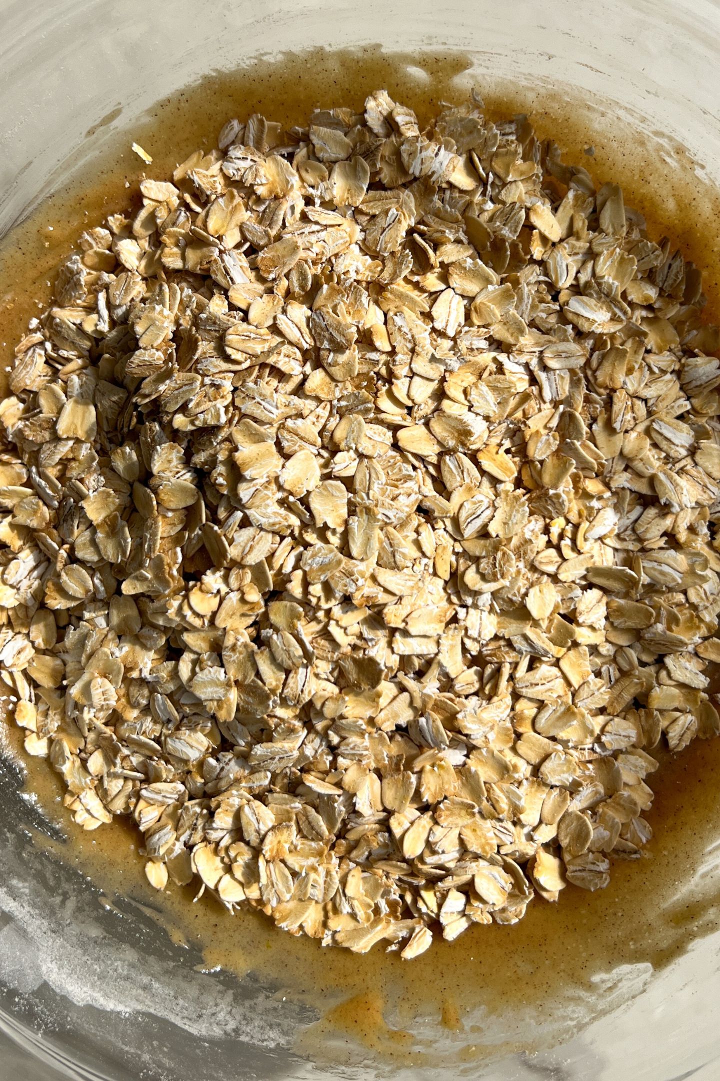 Adding rolled oats to the batter.