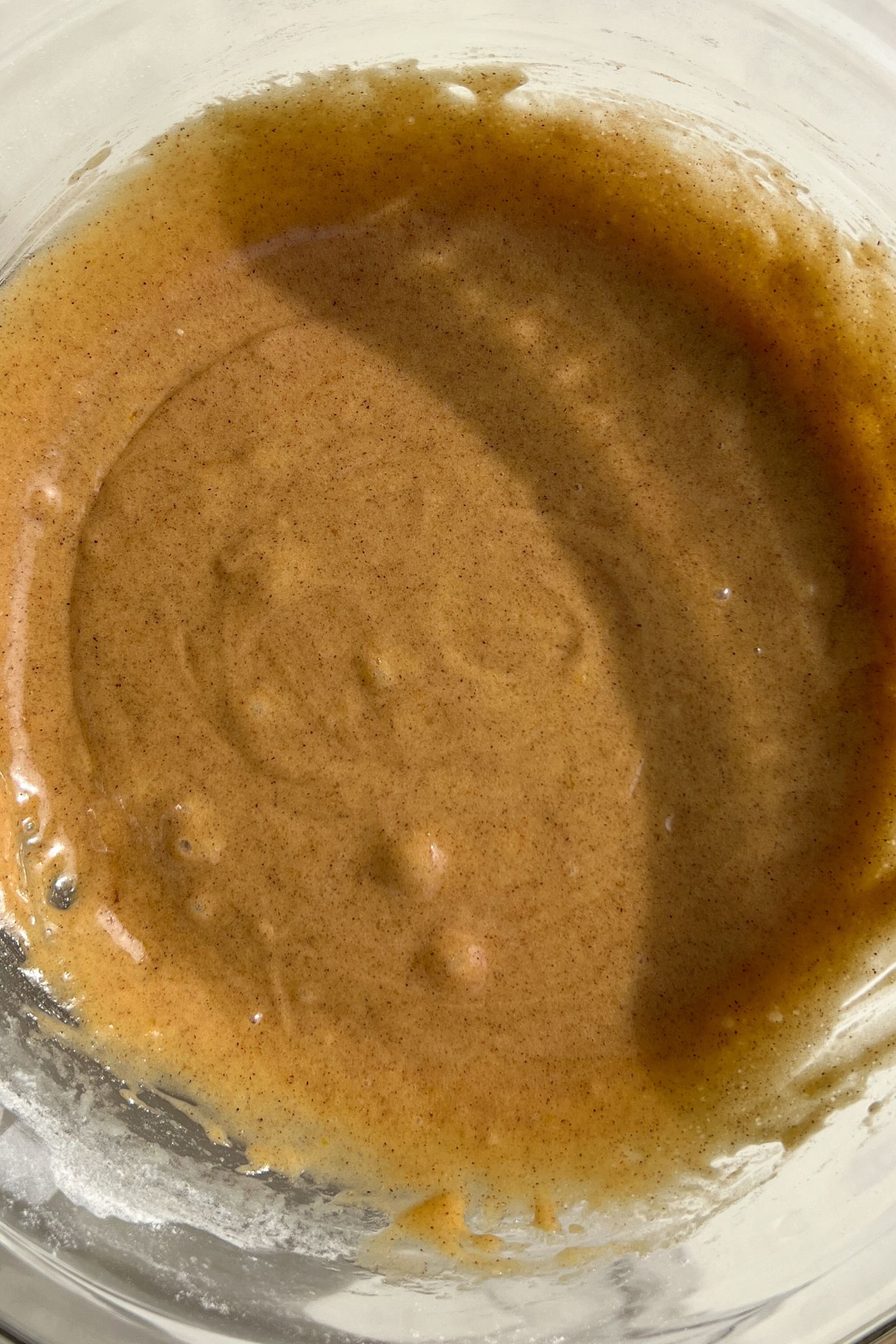 Making the batter in a mixing bowl.