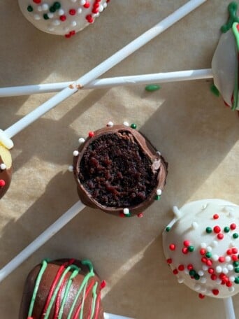 Christmas Cake Pop with a bite taken out of it.