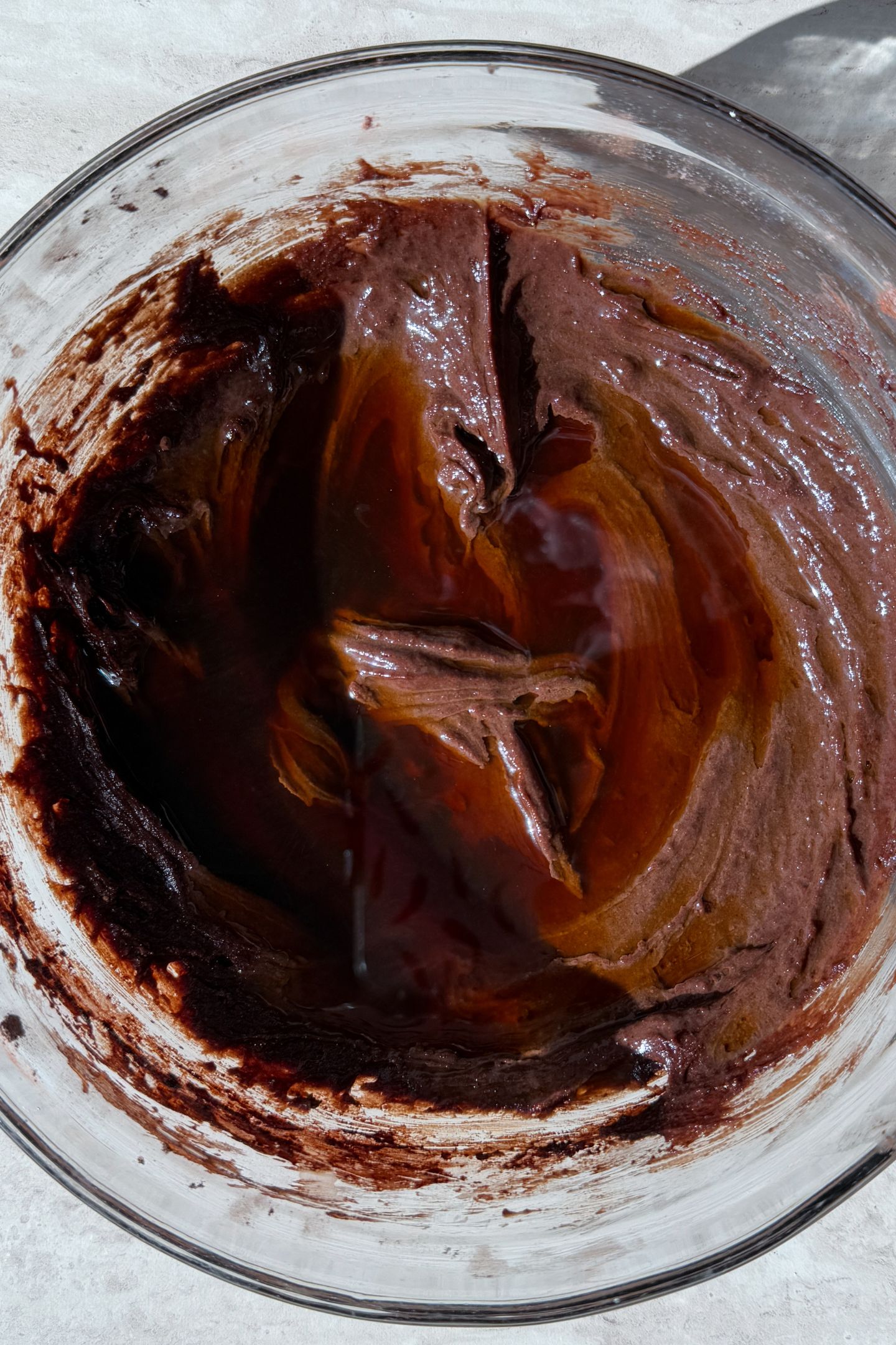 Adding the hot coffee to the batter.