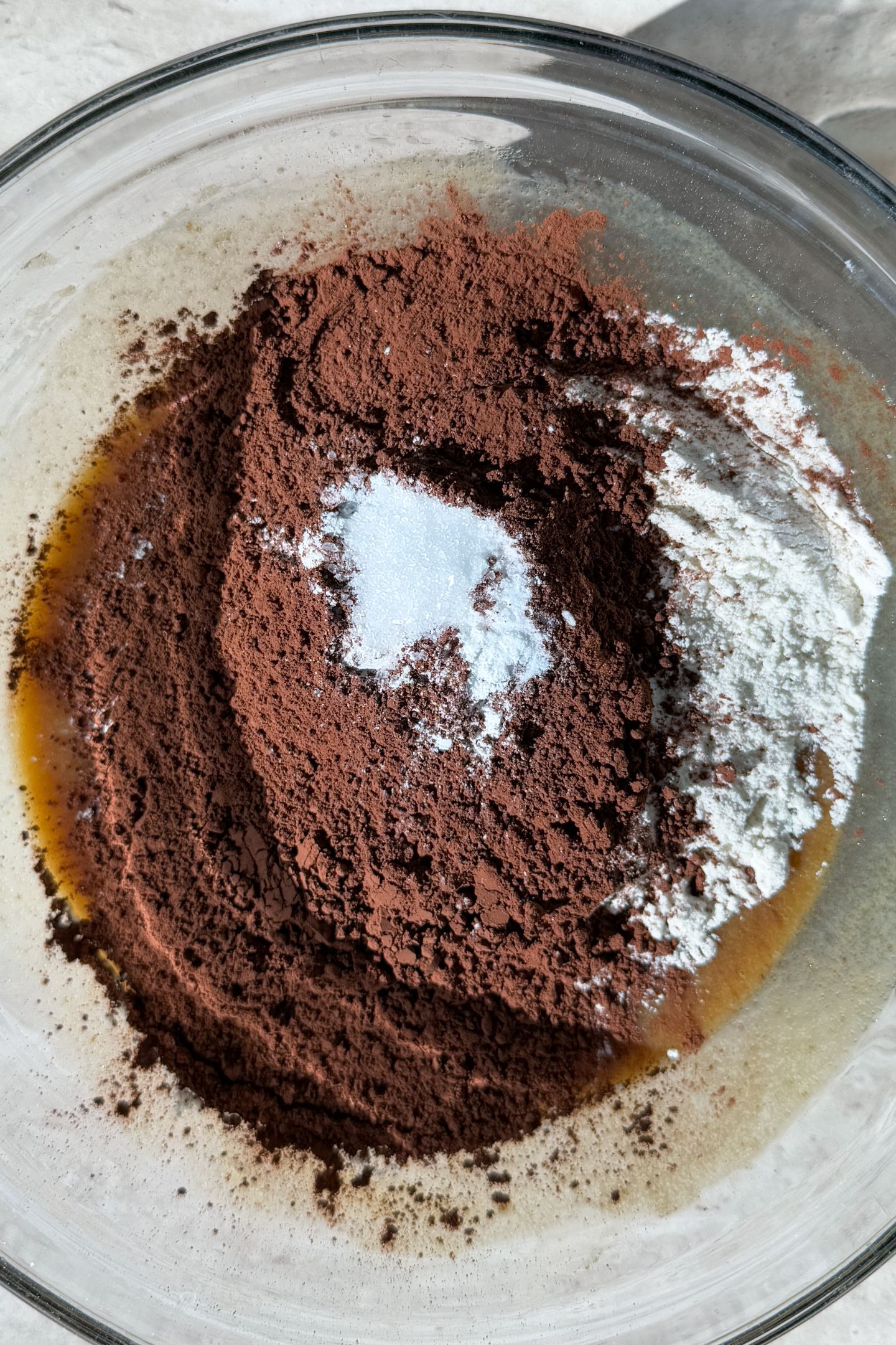 The dry ingredients added to the wet ingredients.