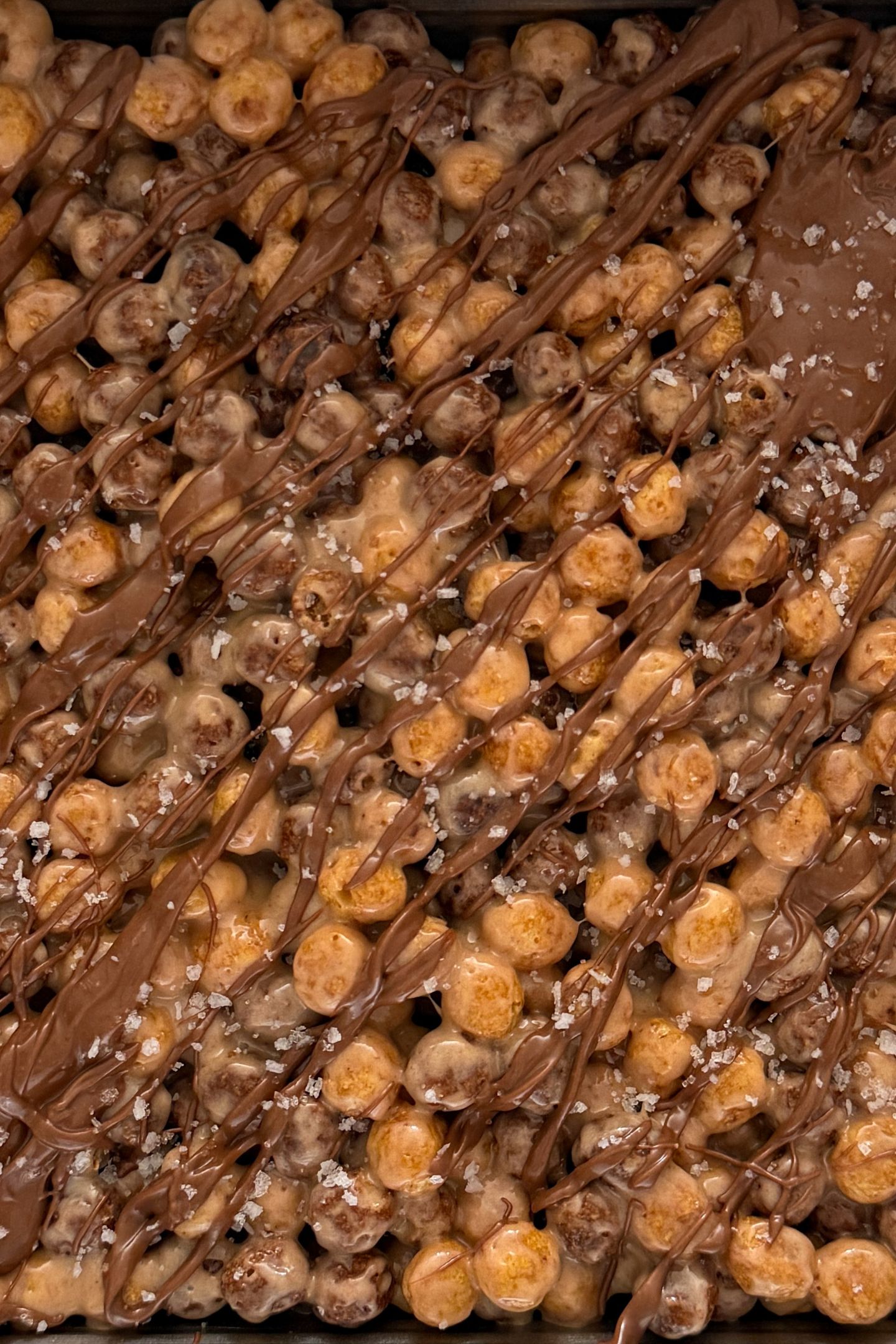 Drizzling melted chocolate on top and adding sea salt flakes.