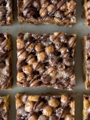 Sliced peanut butter and chocolate Krispie treats on a platter.