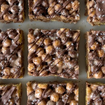 Sliced peanut butter and chocolate Krispie treats on a platter.