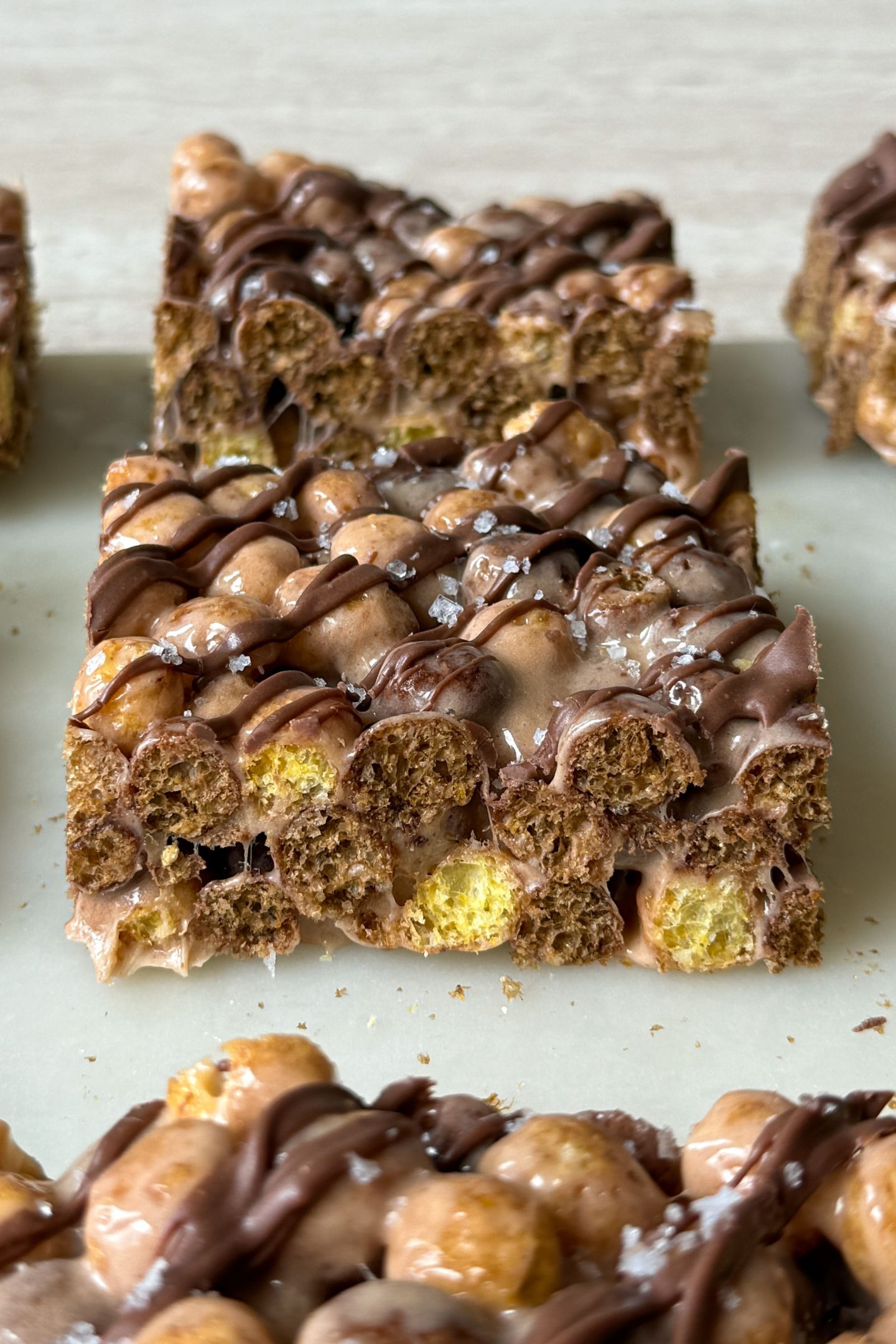 Side view of chocolate peanut butter krispie treats.