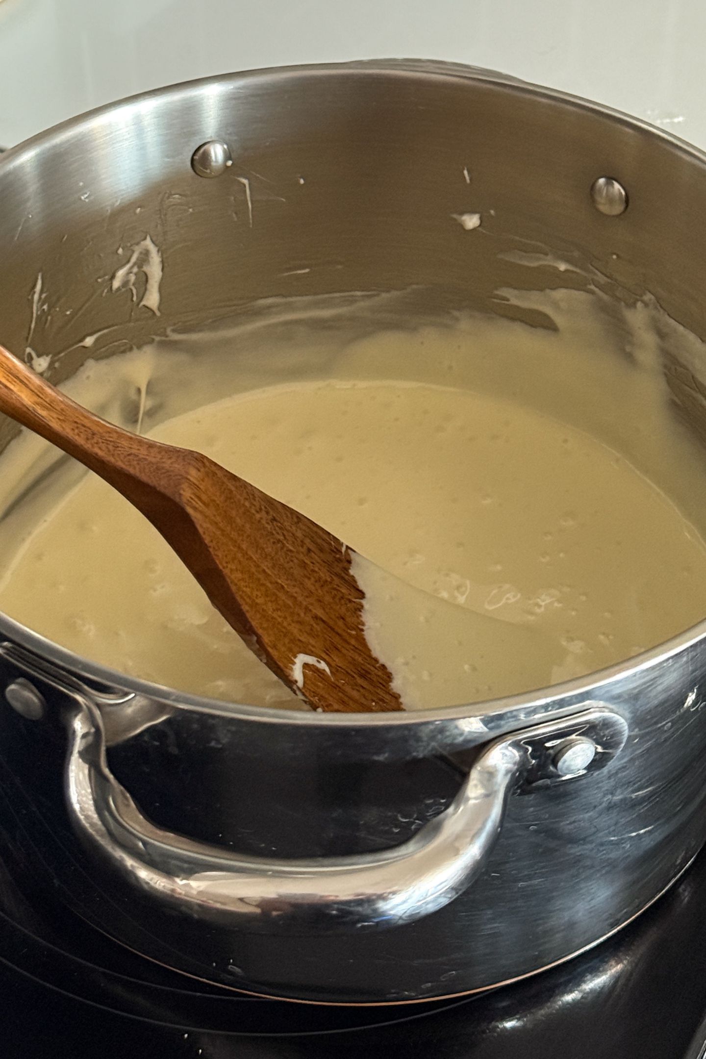 The mini marshmallows have melted in the pan.