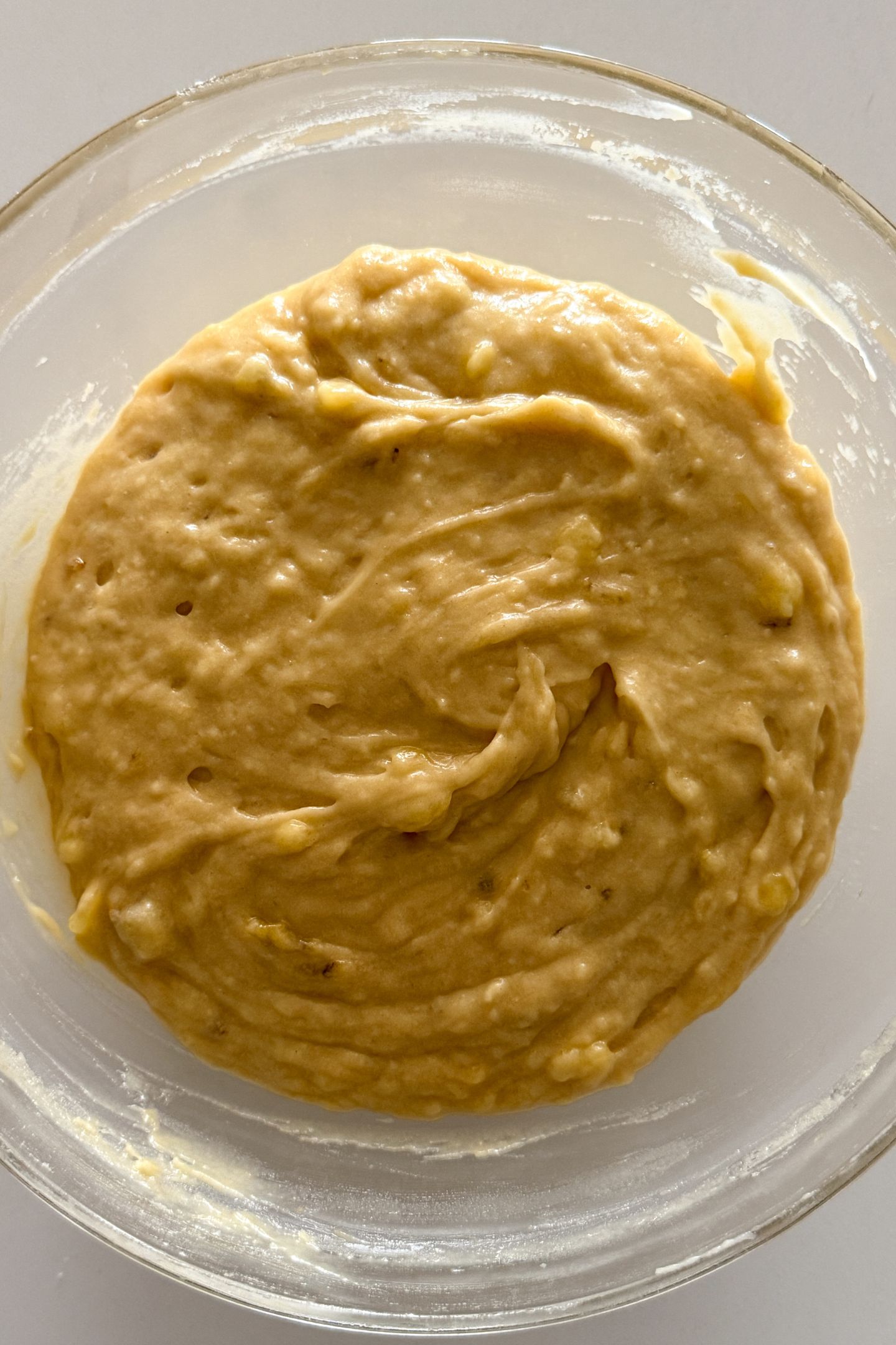 Banana bread batter in bowl.