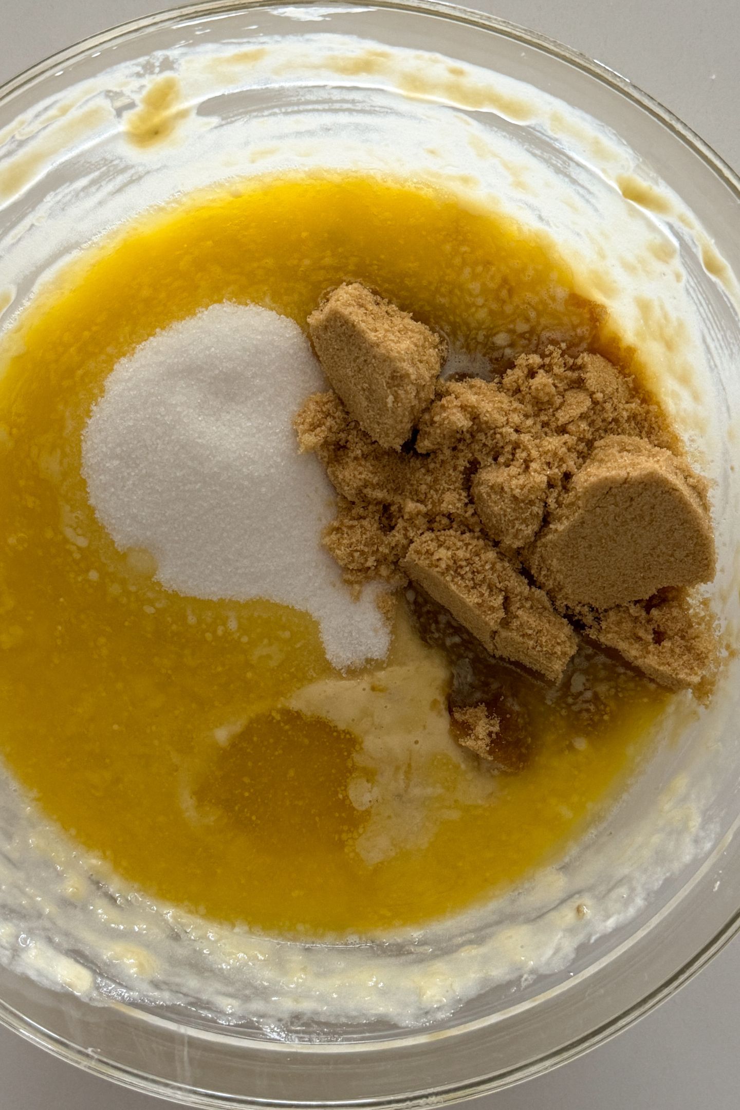 Combining all wet ingredients in the large mixing bowl.