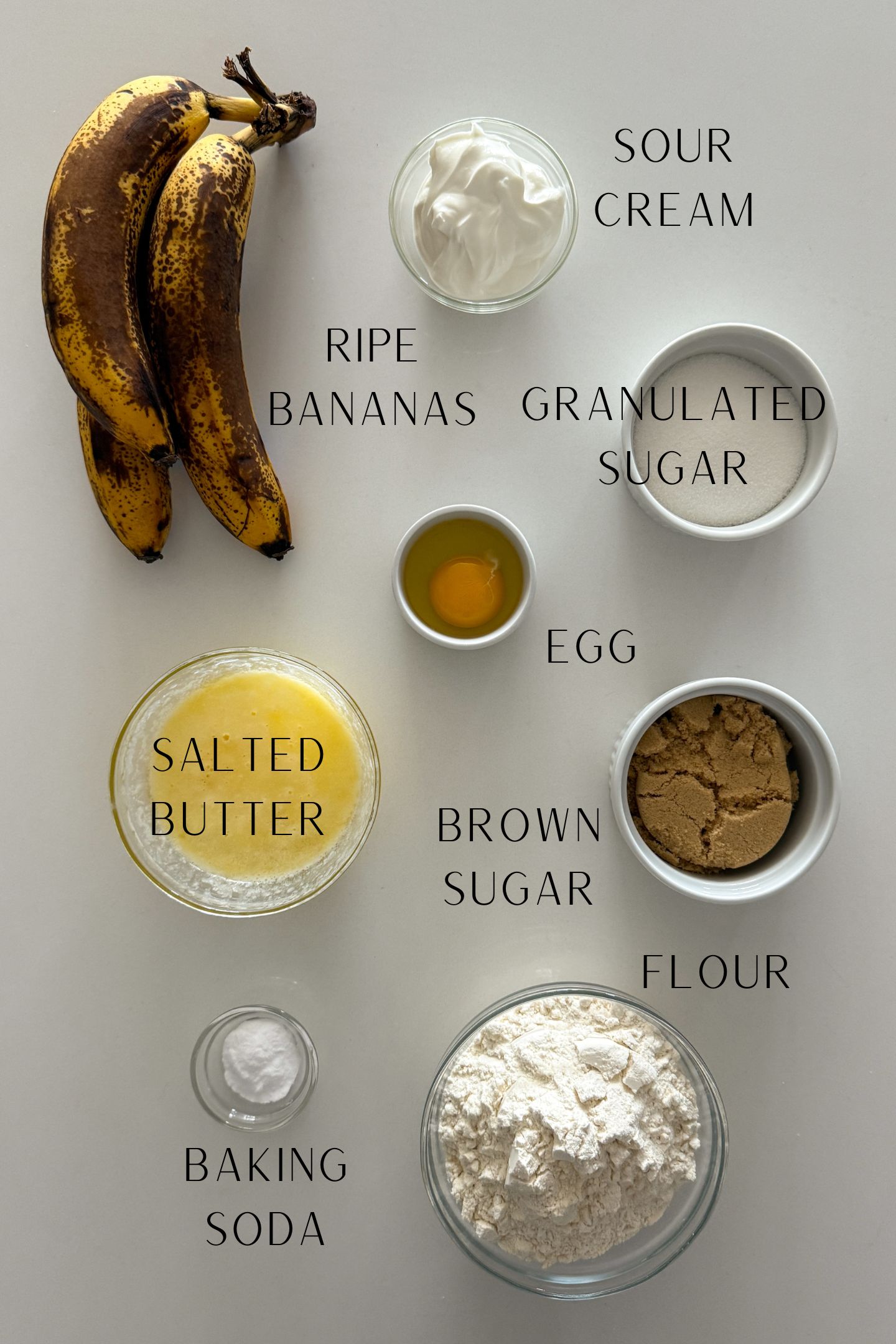 Ingredients measured out in bowls to make the batter for the banana bread coffee cake.