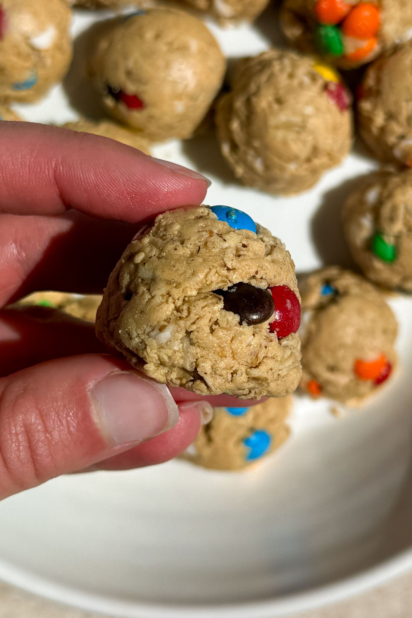 Holding a protein ball in my hand.