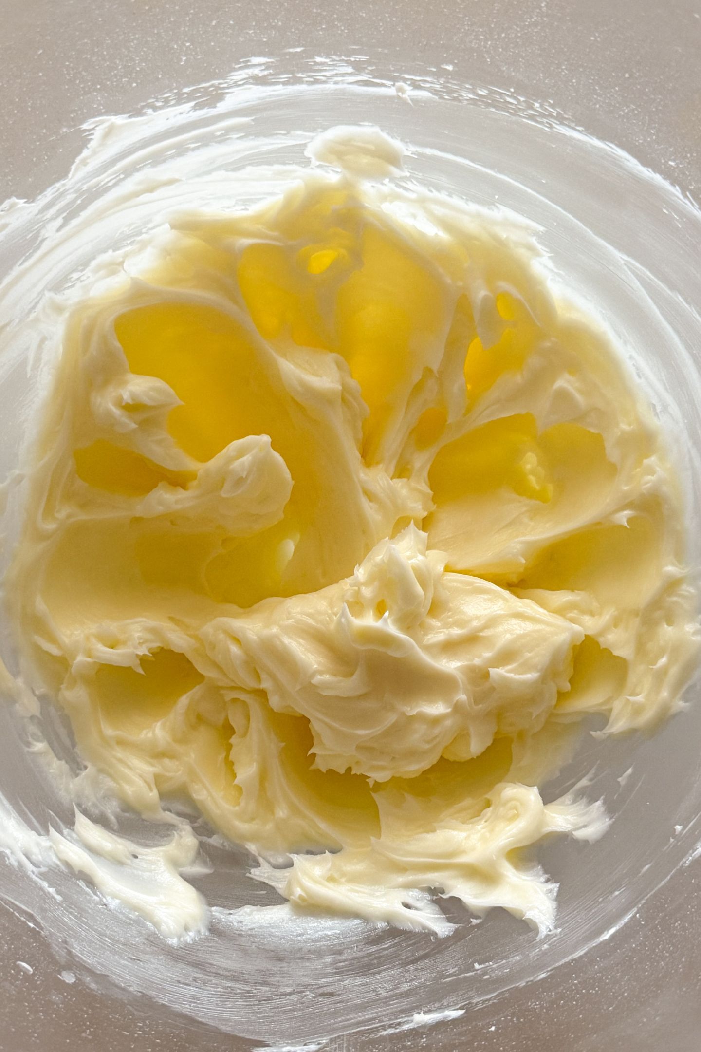Combining the wet ingredients in a bowl to make the cookie dough.