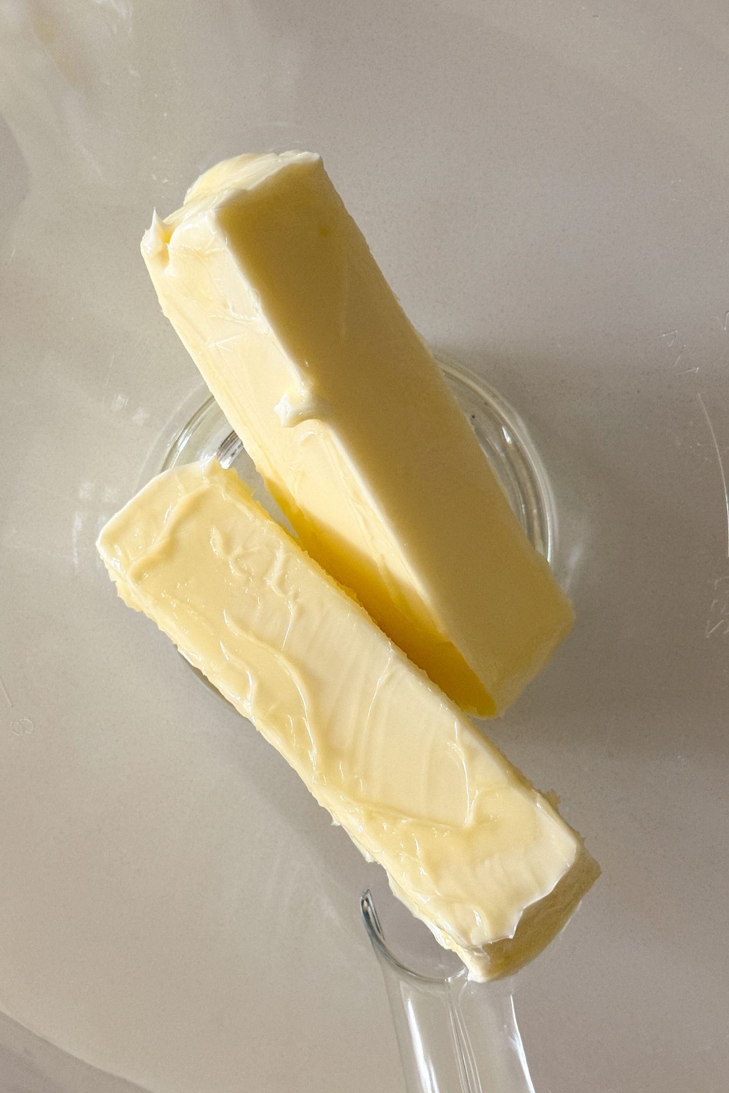 Combining the wet ingredients in a bowl to make the cookie dough.