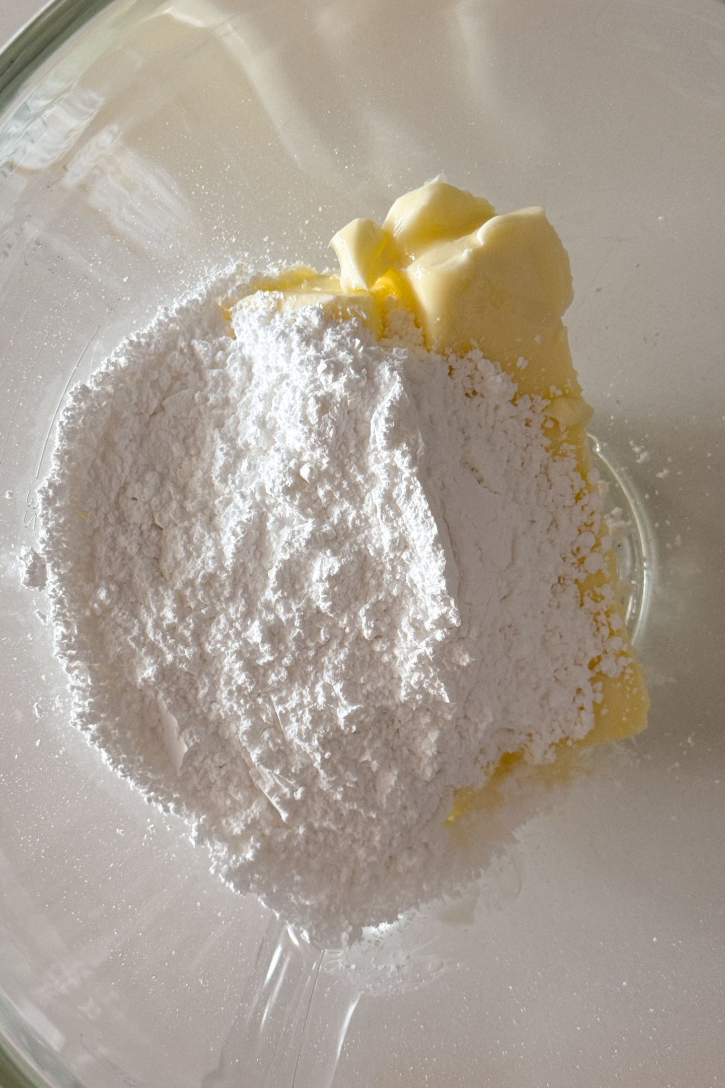 Combining the wet ingredients in a bowl to make the cookie dough.
