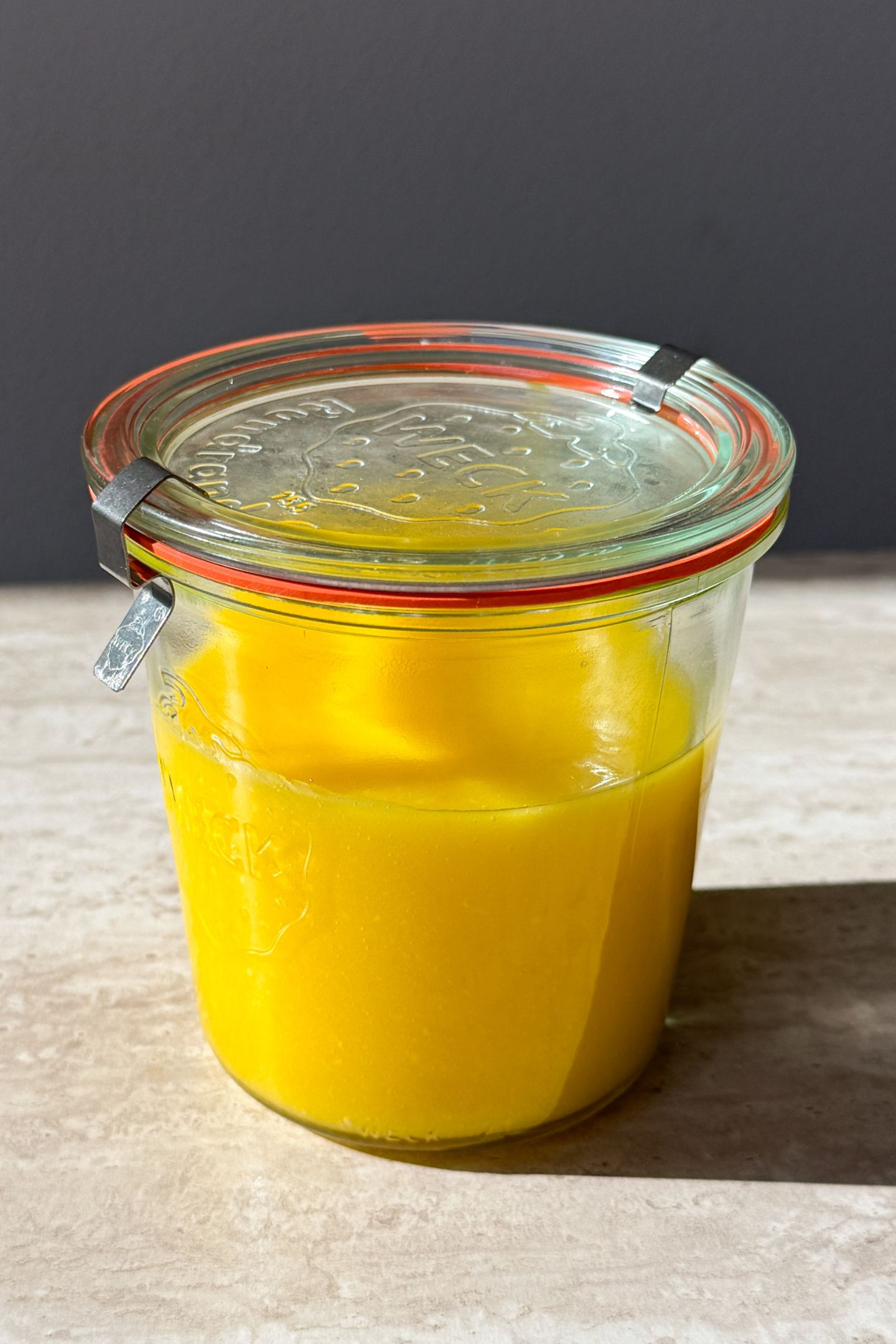 Lemon curd in a mason jar.