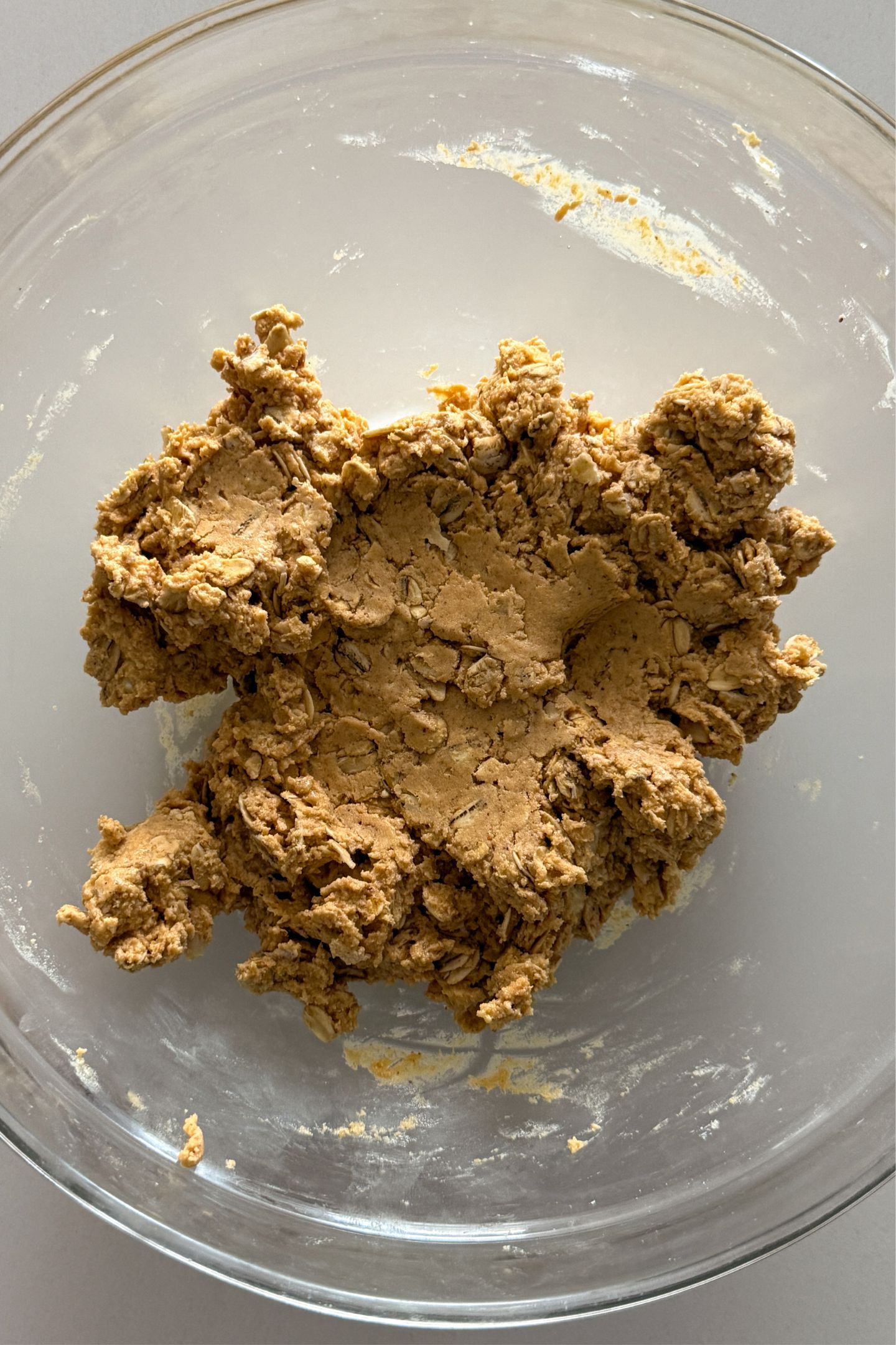 Peanut butter oat dough in a bowl.