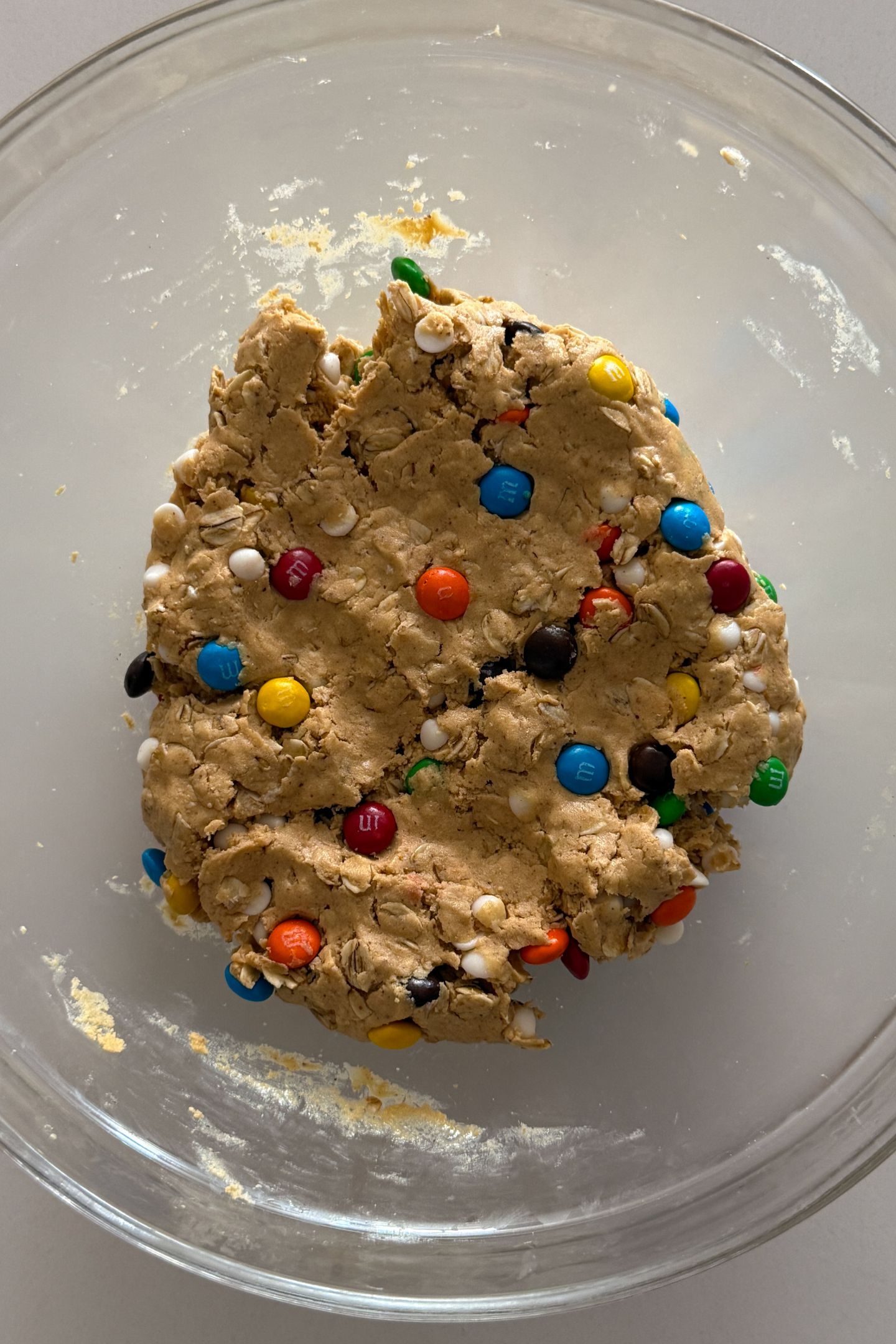 Monster cookie dough in a bowl to make the protein balls.