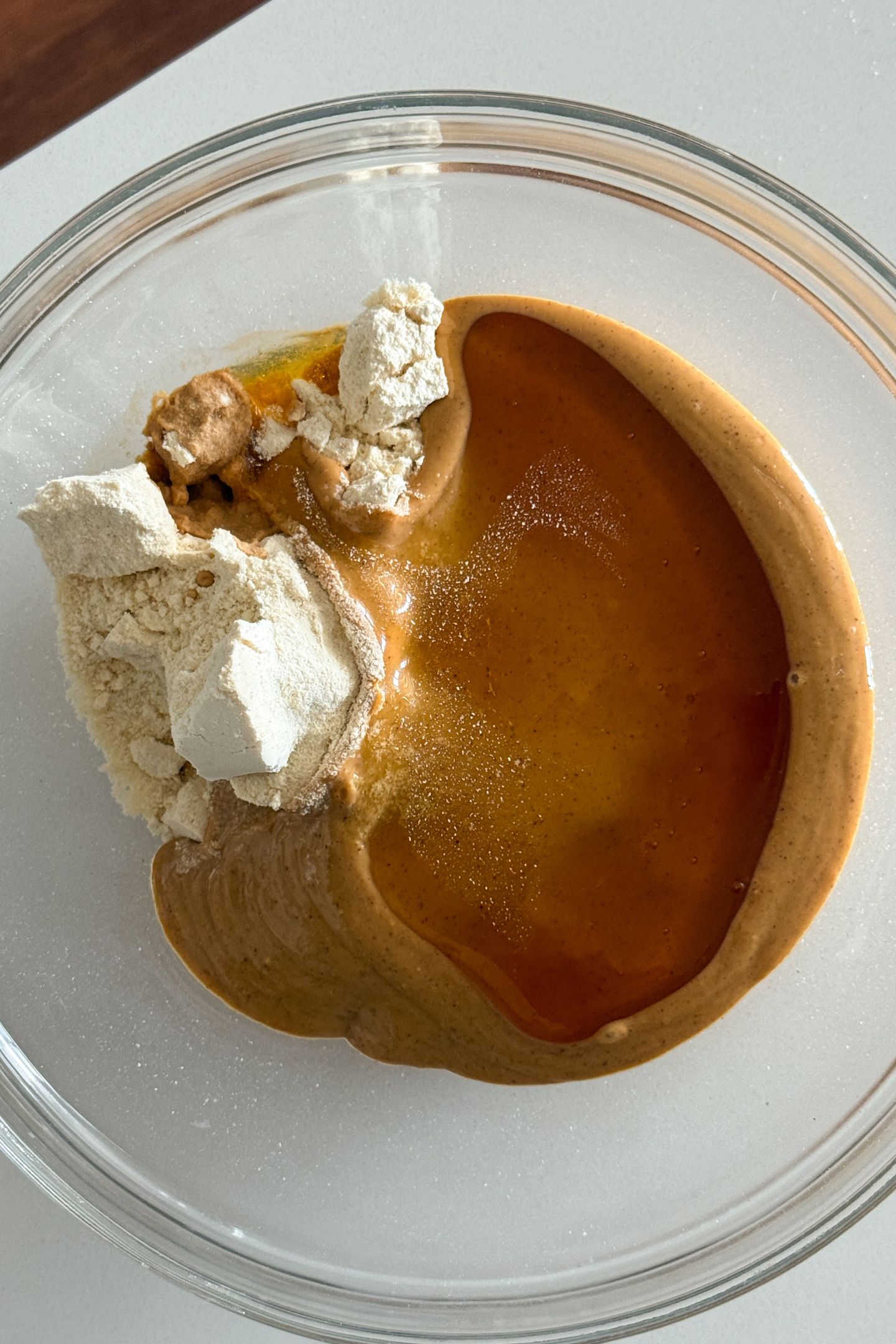 Ingredients to make the protein balls in a large mixing bowl.
